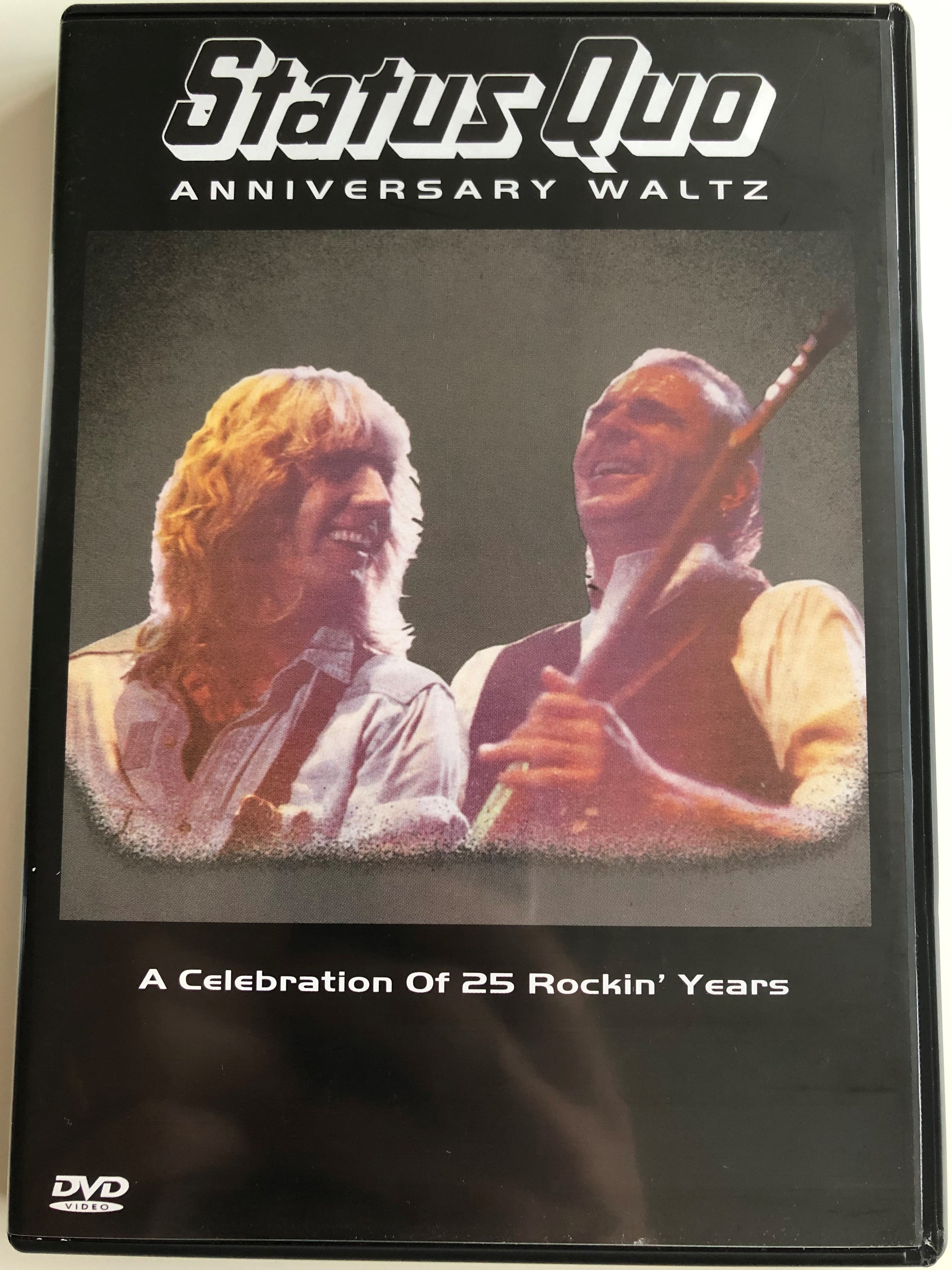 status-quo-anniversary-waltz-dvd-a-celebration-of-25-rockin-years-1.jpg