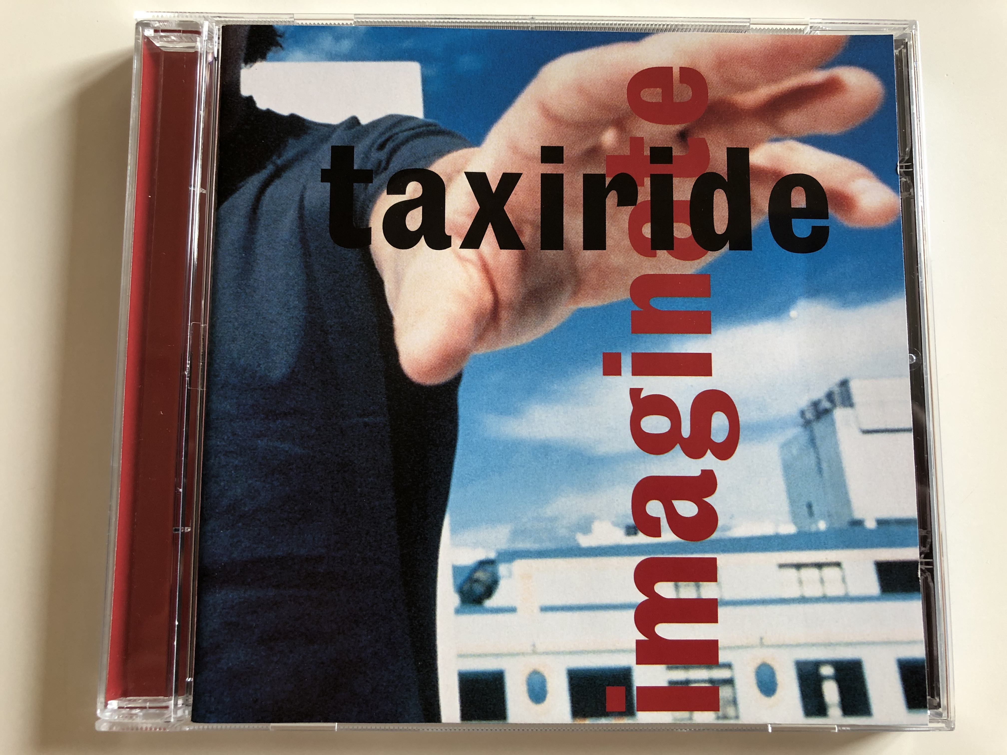 taxiride-imaginate-wea-records-audio-cd-1999-3984-27722-2-1-.jpg