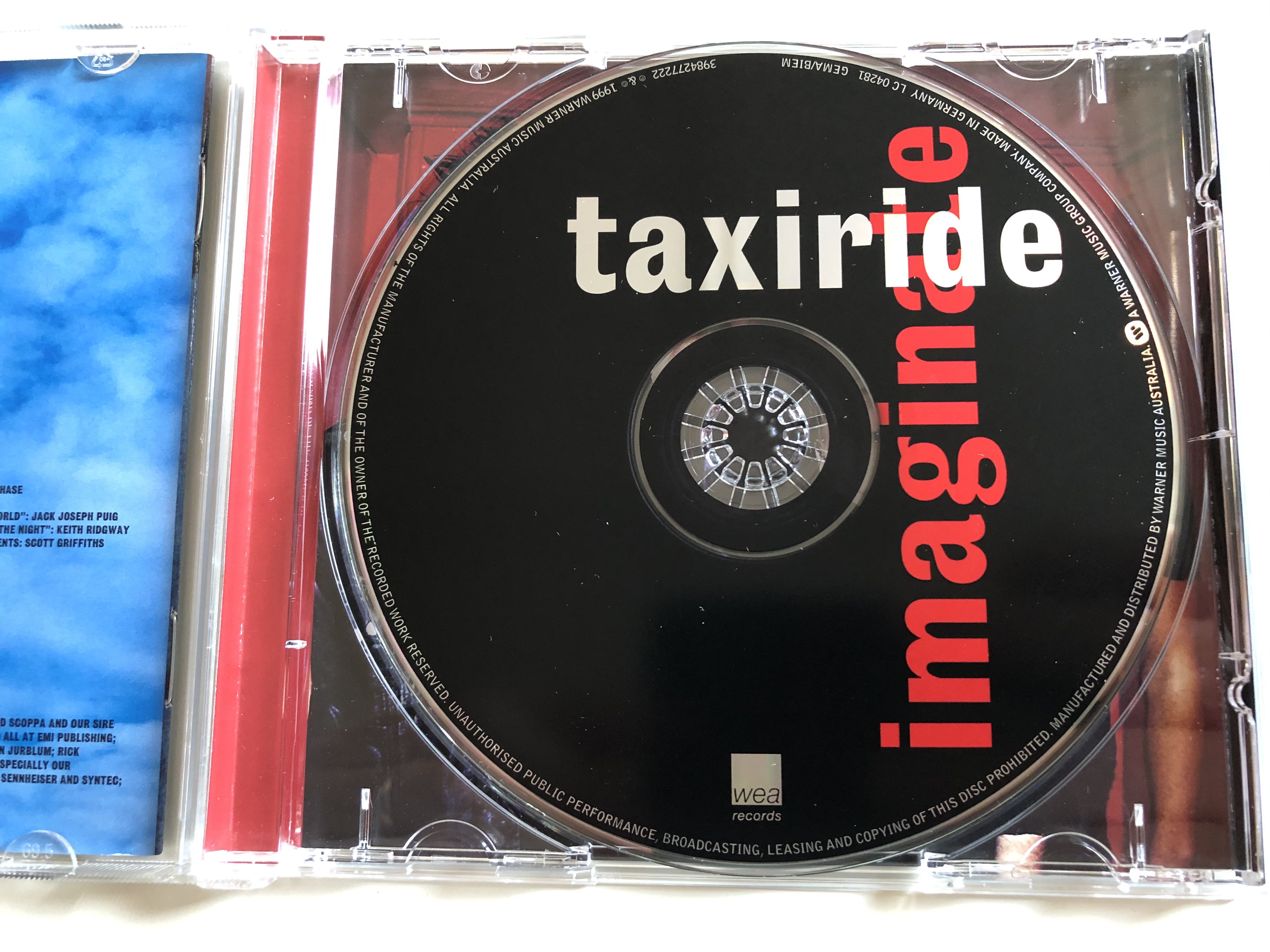 taxiride-imaginate-wea-records-audio-cd-1999-3984-27722-2-4-.jpg