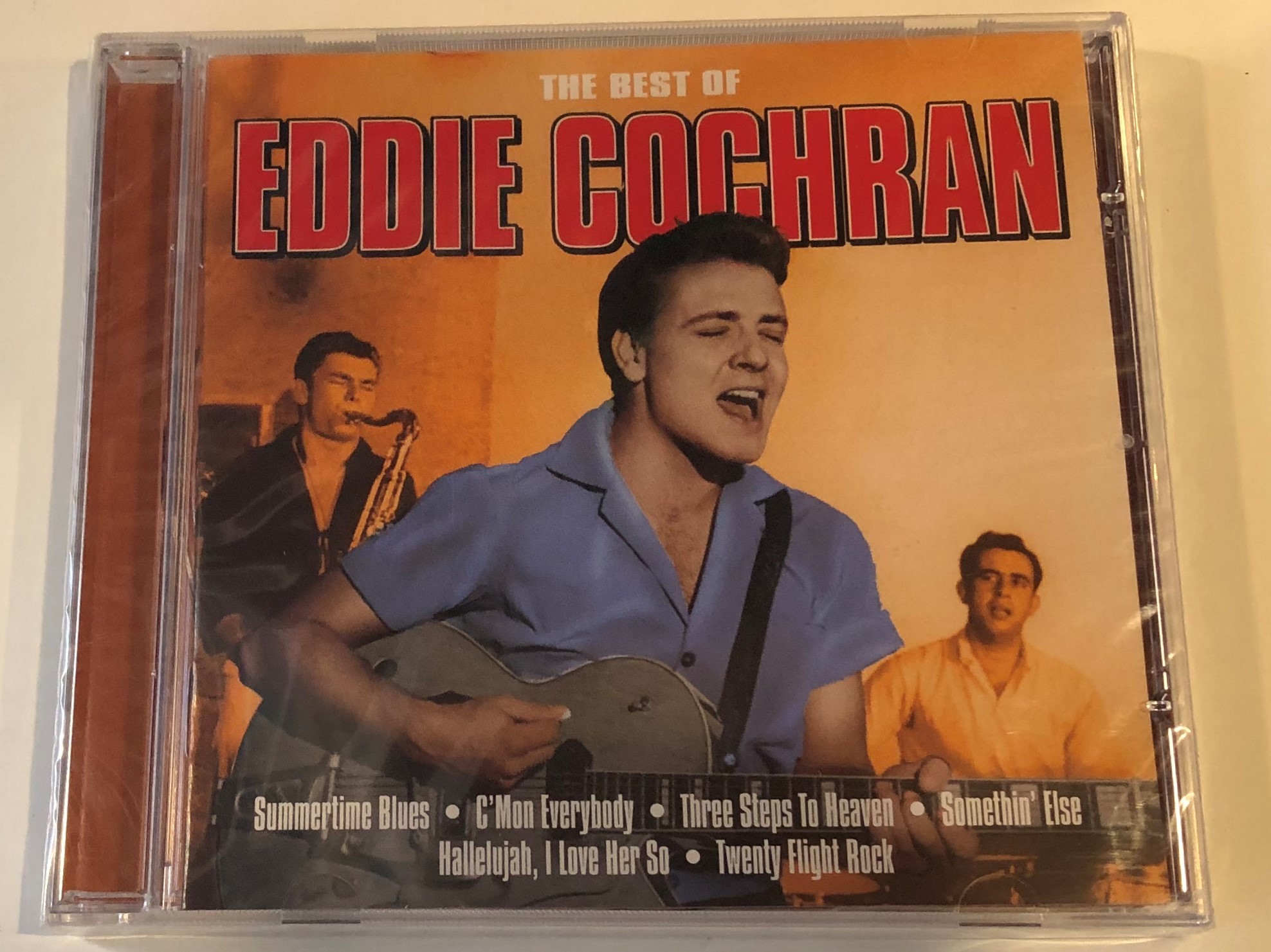 the-best-of-eddie-cochran-summertime-blues-c-mon-everybody-three-steps-to-heaven-somethin-else-hallelujah-i-love-her-so-twenty-flight-rock-emi-gold-audio-cd-2004-724357144322-1-.jpg