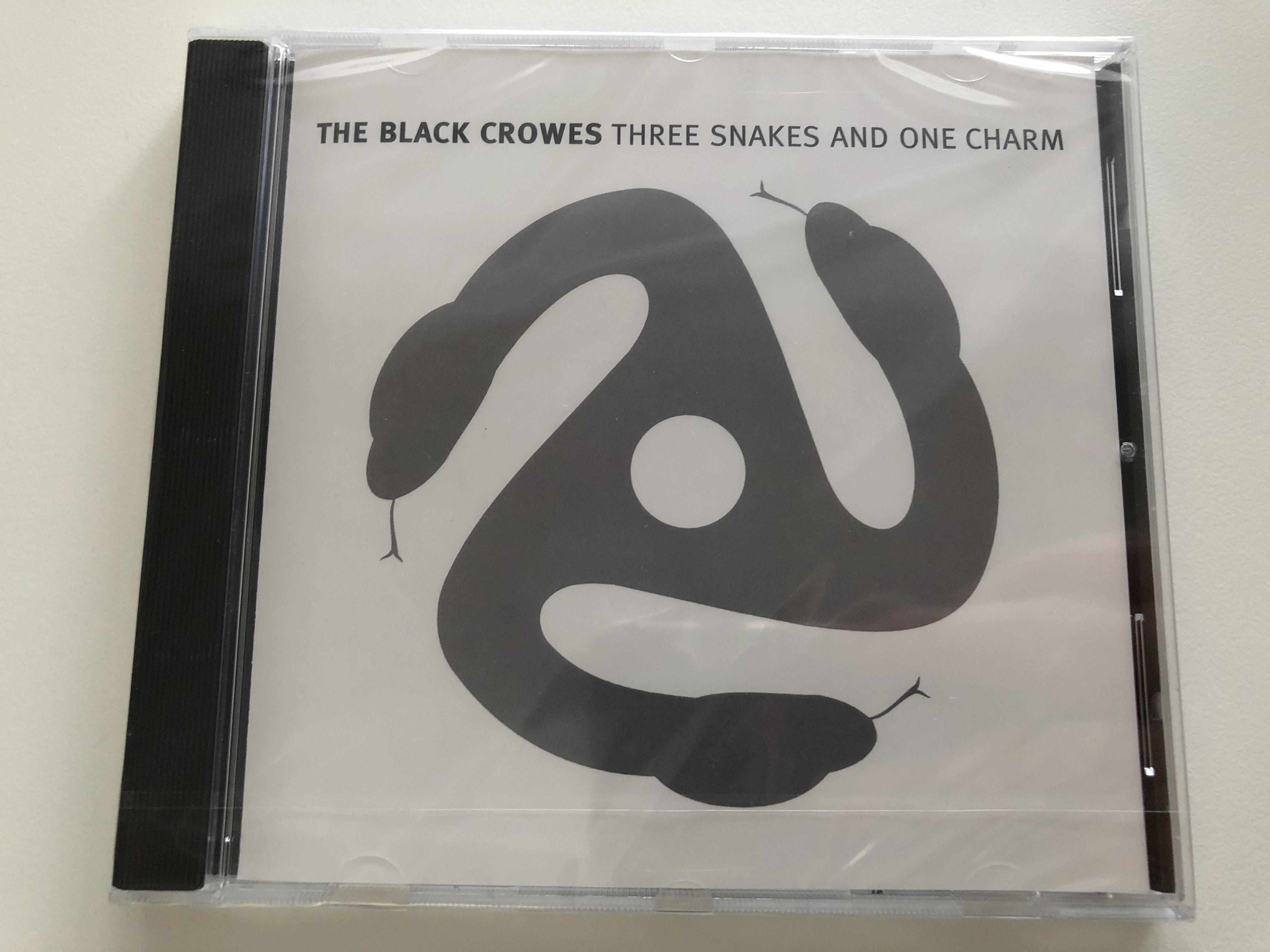 the-black-crowes-three-snakes-and-one-charm-american-recordings-audio-cd-2009-88697146362-1-.jpg