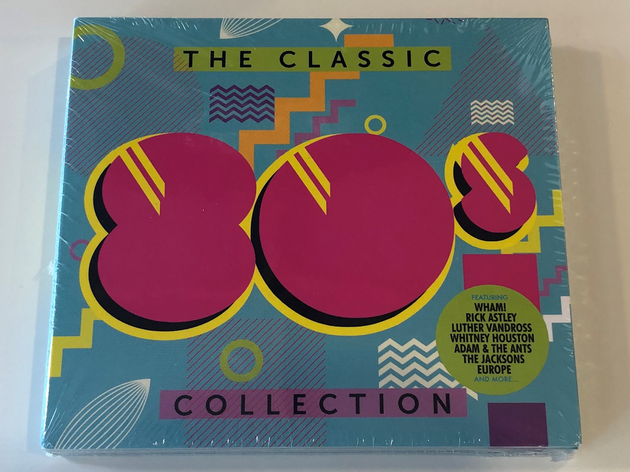 the-classic-80s-collection-featuring-wham-rick-astley-luther-vandross-whitney-houston-adam-the-ants-the-jacksons-europe-and-many-more...-sony-music-3x-audio-cd-2017-88985440422-1-.jpg