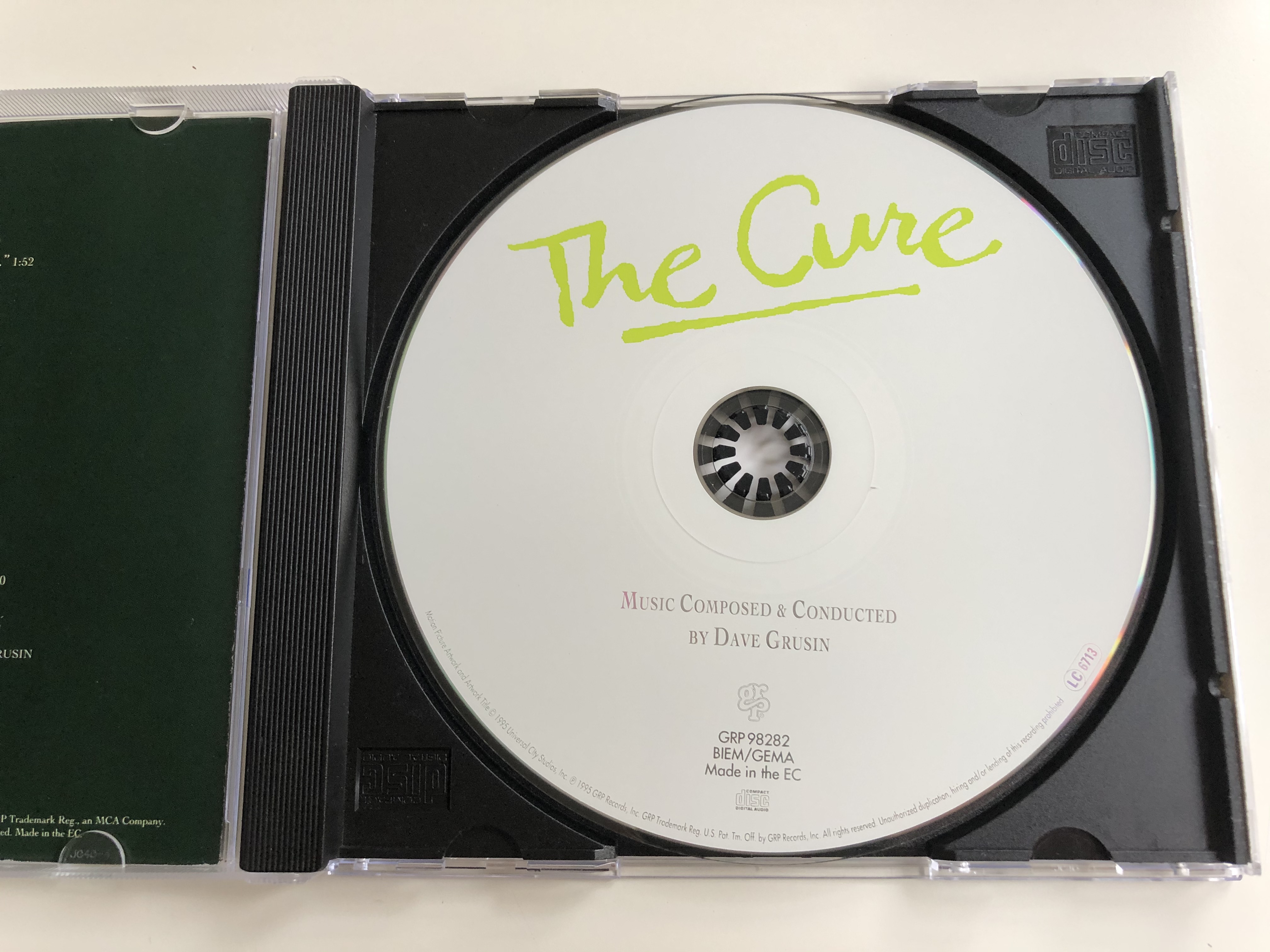 the-cure-original-motion-picture-soundtrack-music-composed-conducted-by-dave-grusin-two-boys-found-way-to-make-one-summer-lost-a-lifetime-grp-audio-cd-1995-grp-98282-5-.jpg