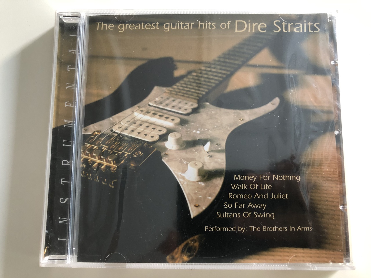The Greatest guitar hits of Dire Straits - Money for nothing, Walk of Life,  Romeo and Juliet, So far away, Sultans of Swing / Performed by: The Brothers  in Arms / Instrumental /