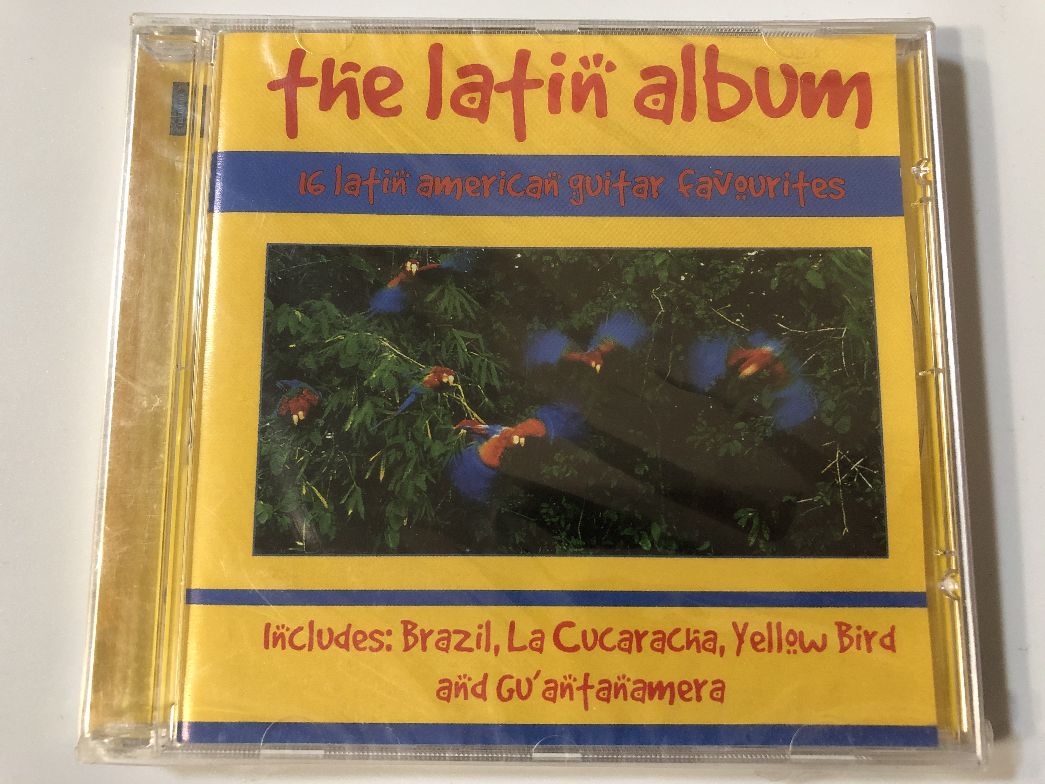 the-latin-album-16-latin-american-guitar-favourites-includes-brazil-la-cucaracha-yellow-bird-and-guantamanera-hallmark-records-audio-cd-2002-700802-1-.jpg
