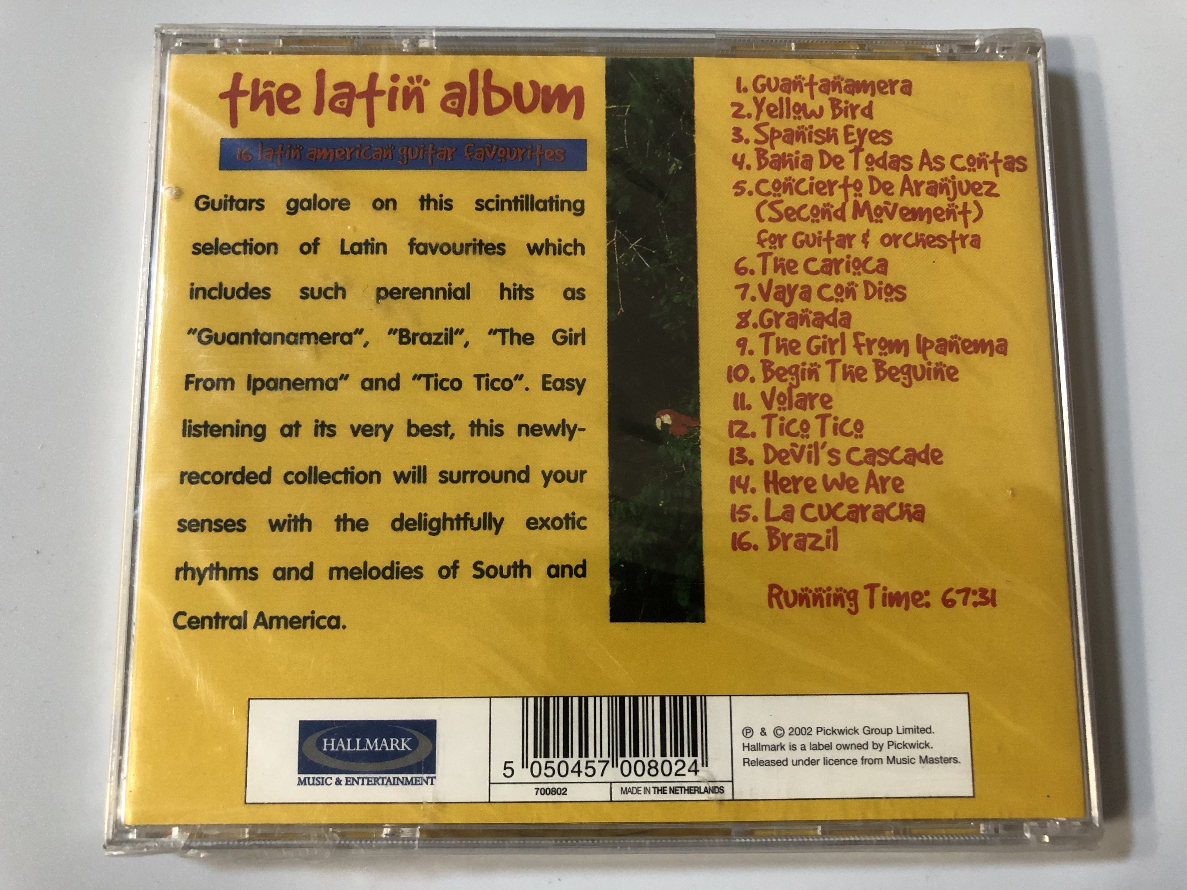 the-latin-album-16-latin-american-guitar-favourites-includes-brazil-la-cucaracha-yellow-bird-and-guantamanera-hallmark-records-audio-cd-2002-700802-2-.jpg