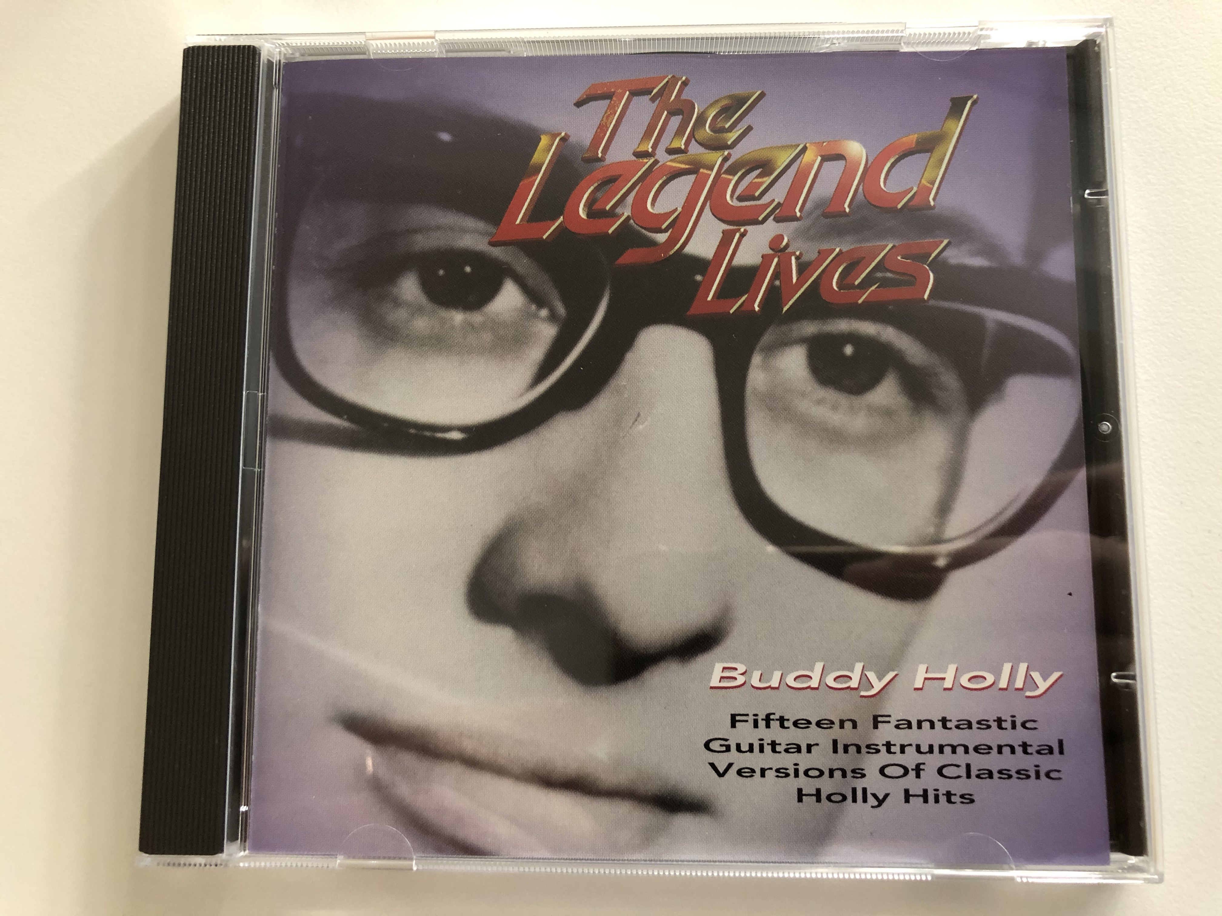 the-legend-lives-buddy-holly-fifteen-fantastic-guitar-instrumental-versions-of-classic-holly-hits-hallmark-audio-cd-304552-1-.jpg