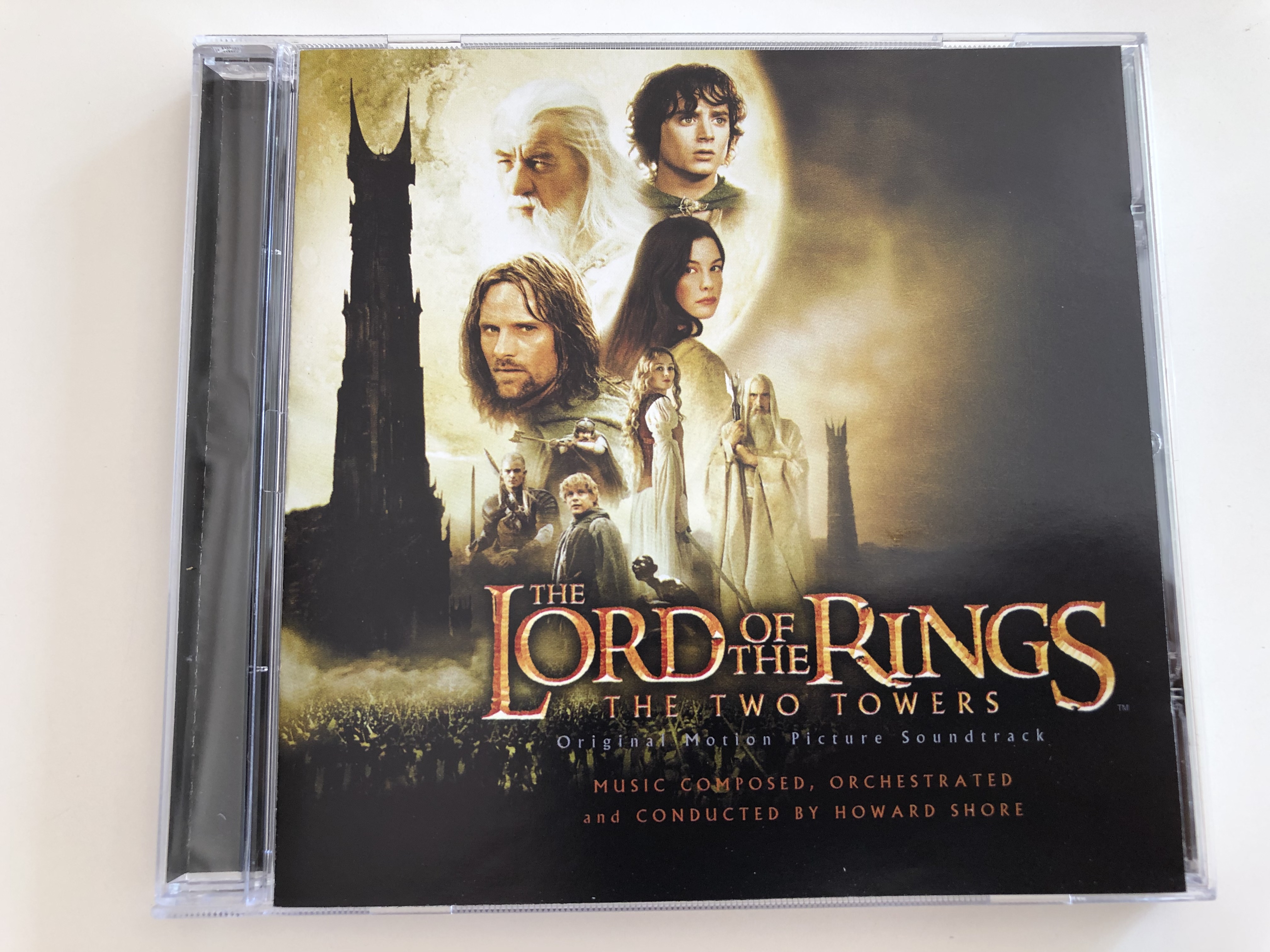 the-lord-of-the-rings-the-two-towers-original-motion-picture-soundtrack-music-composed-orchestrated-and-conducted-by-howard-shore-audio-cd-2002-warner-music-1-.jpg