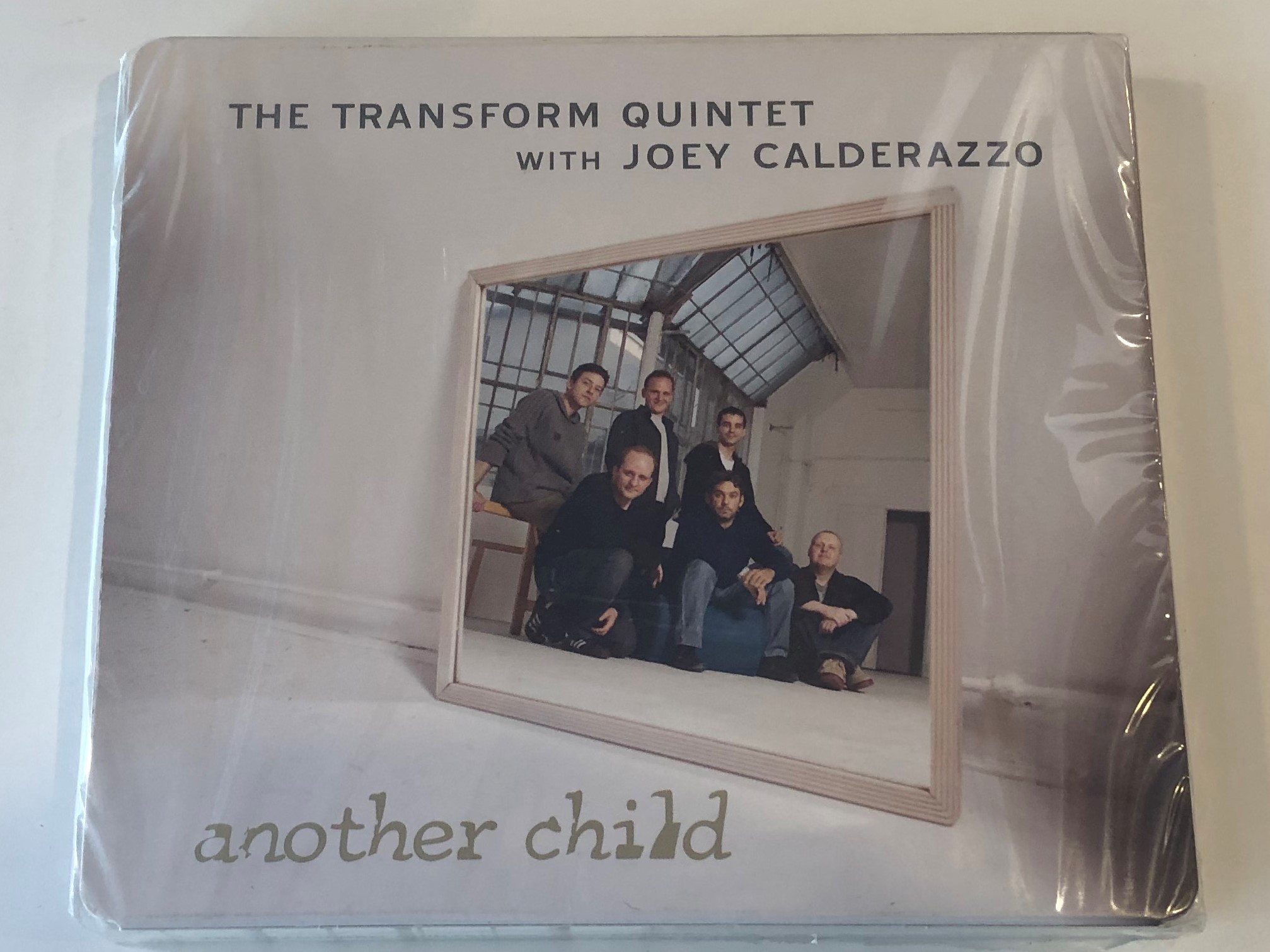 the-transform-quintet-with-joey-calderazzo-another-child-narrator-records-audio-cd-2010-nrr077-1-.jpg