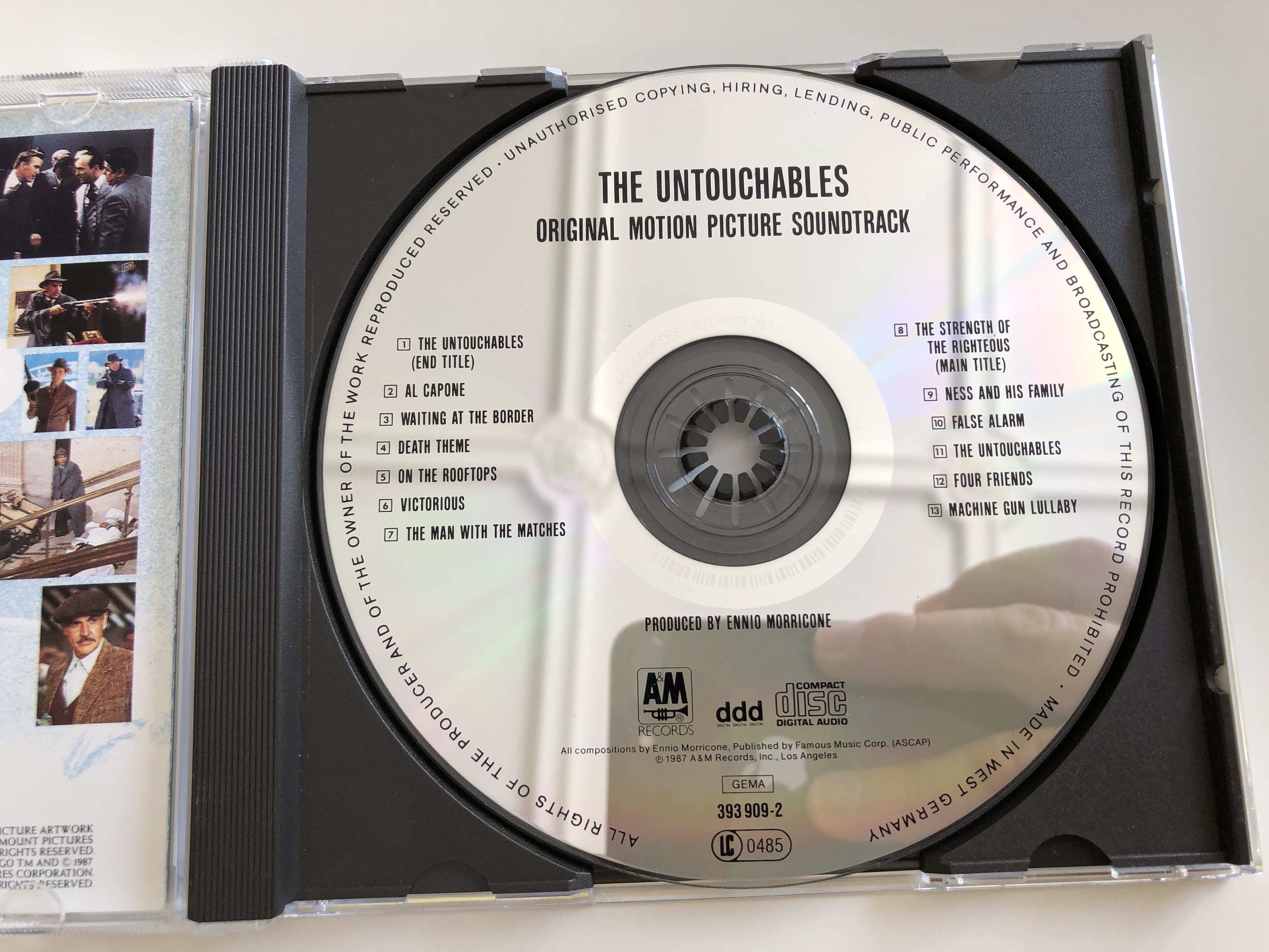 the-untouchables-original-motion-picture-soundtrack-music-composed-orchestrated-conducted-by-ennio-morricone-audio-cd-1987-a-m-records-393-909-2-5-.jpg