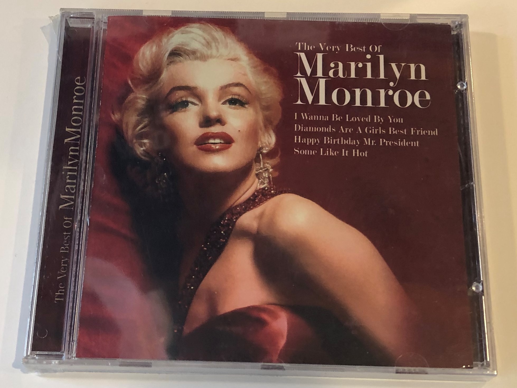 the-very-best-of-marilyn-monroe-i-wanna-be-loved-by-you-diamonds-are-a-girl-s-best-friend-happy-birthday-mr.-president-some-like-it-hot-time-music-international-ltd.-audio-cd-2004-5033606034-1-.jpg