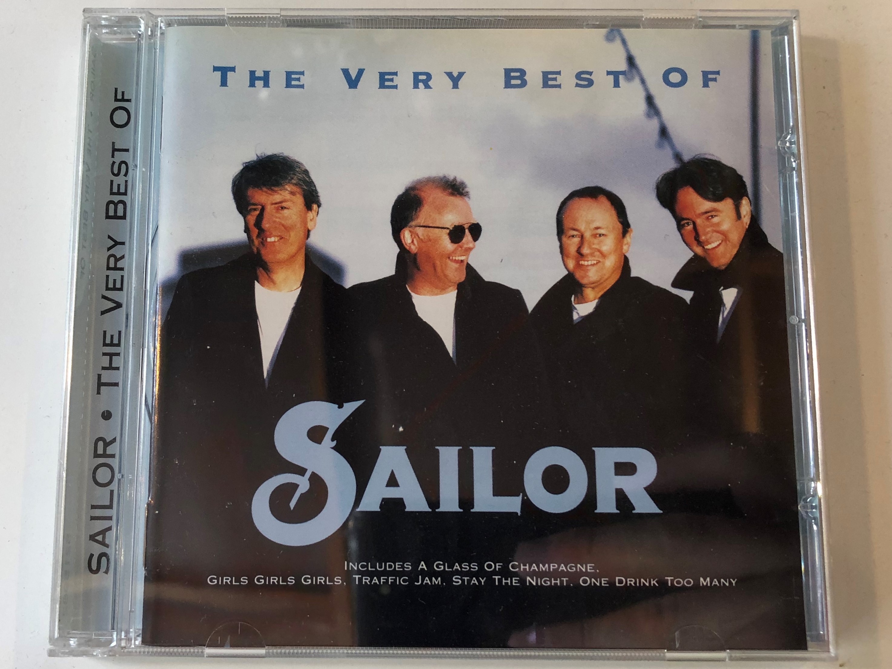 the-very-best-of-sailor-includes-a-glass-of-champagne-girls-girls-girls-traffic-jam-stay-the-night-one-drink-too-many-cmc-records-as-audio-cd-1997-0724352159826-1-.jpg