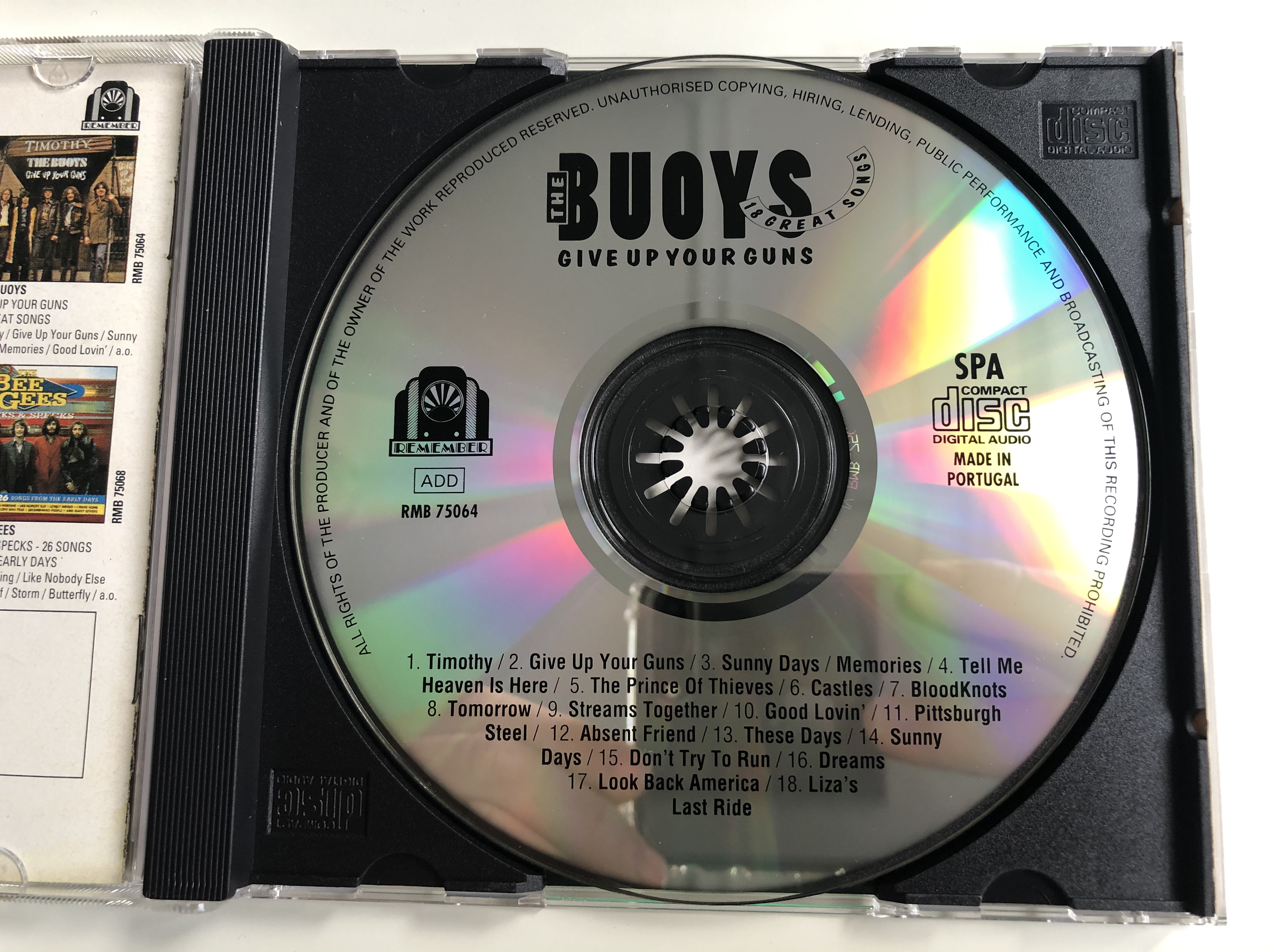 timothy-the-buoys-give-up-your-guns-remember-audio-cd-1993-rmb-75064-3-.jpg