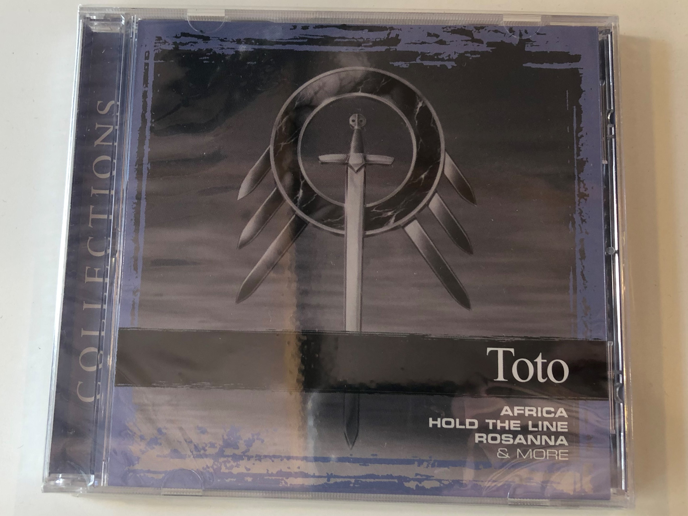 toto-collections-africa-hold-the-line-rosanna-more-sony-bmg-music-entertainment-audio-cd-2006-82876817062-1-.jpg