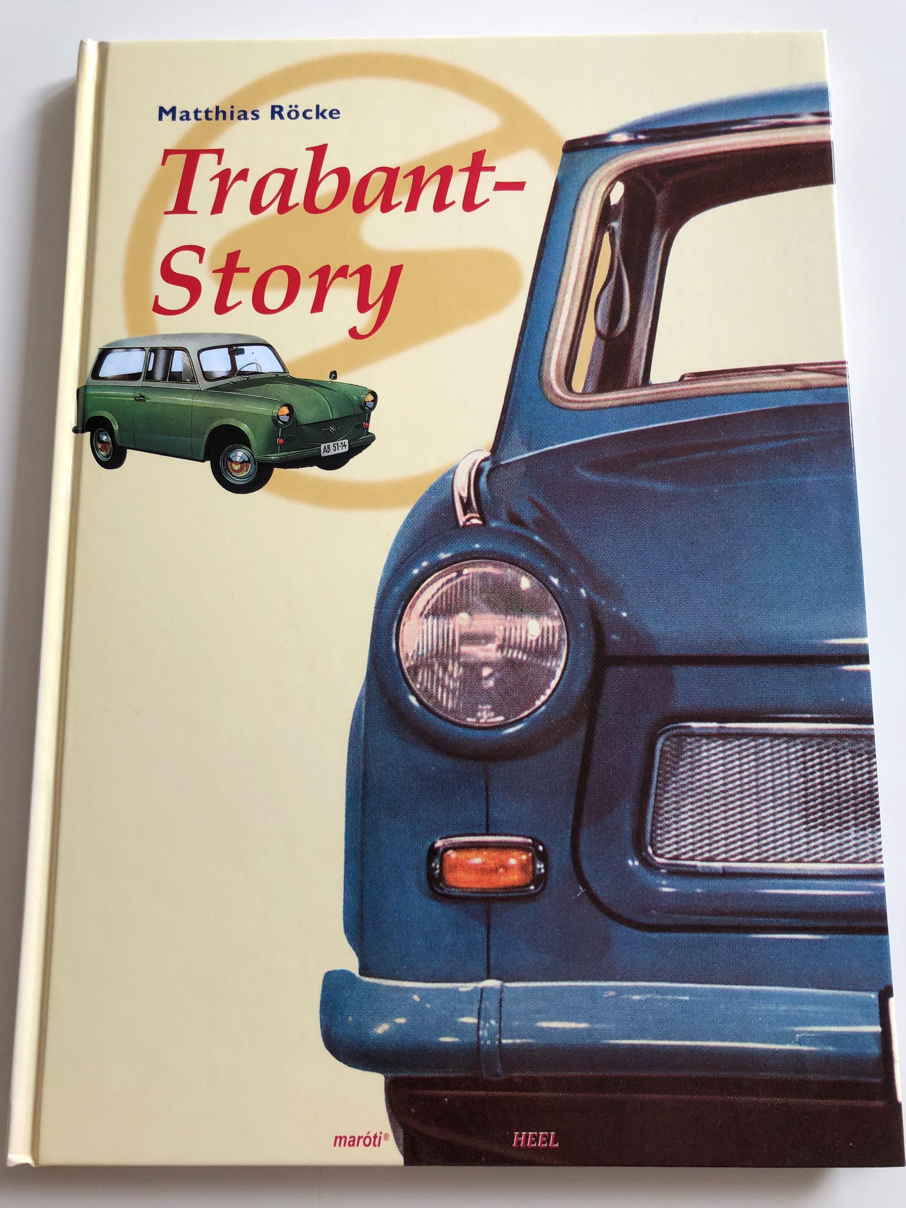 trabant-story-by-matthias-r-cke-hungarian-edition-of-die-trabi-story-trabant-the-popular-east-german-car-history-culture-technical-details-hardcover-2007-mar-ti-k-nyvkiad-1-.jpg