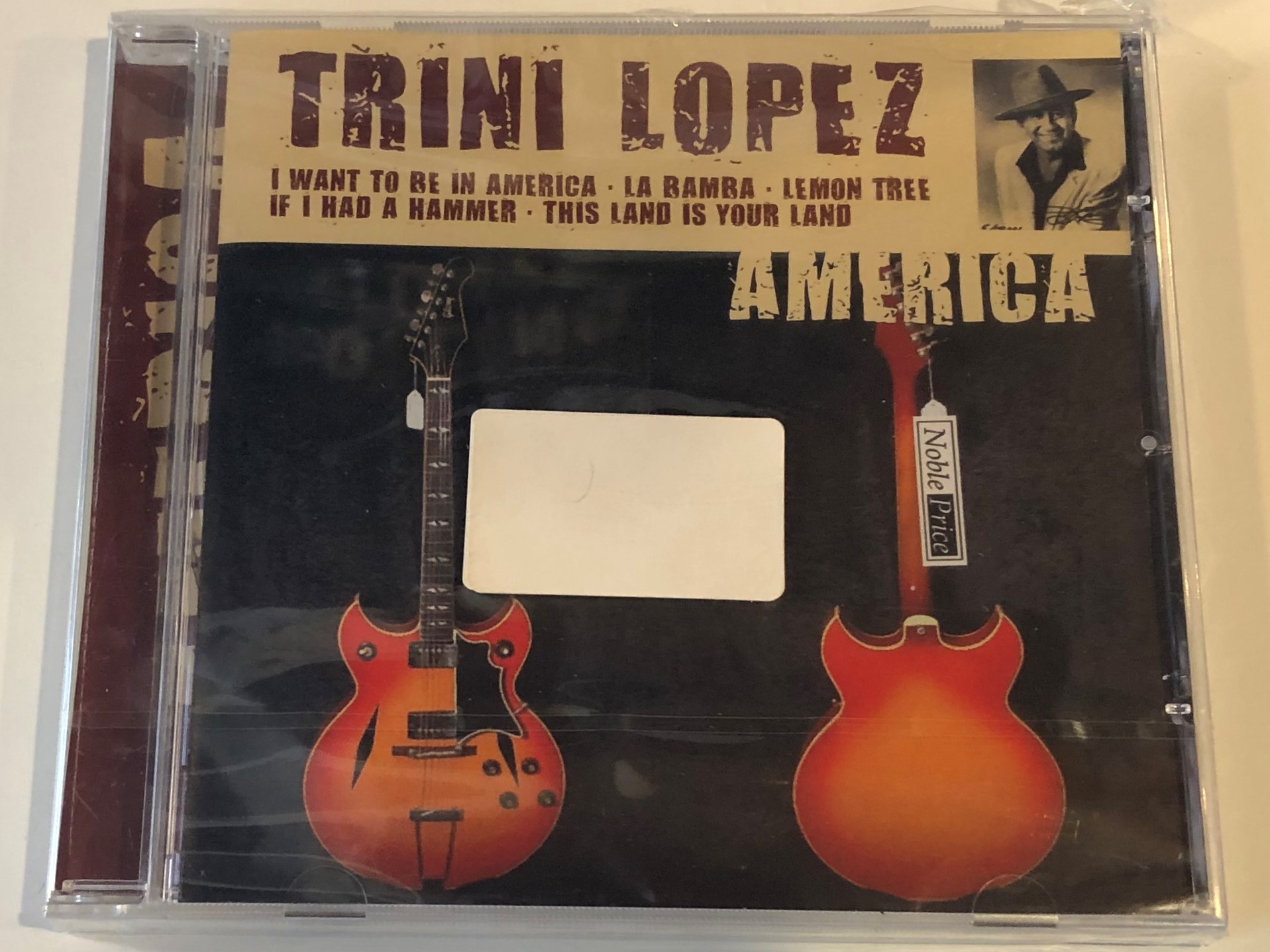 trini-lopez-america-i-want-to-be-in-america-la-bamba-lemon-tree-if-i-had-a-hammer-this-land-is-your-land-membran-international-gmbh-audio-cd-2004-222097-205-1-.jpg