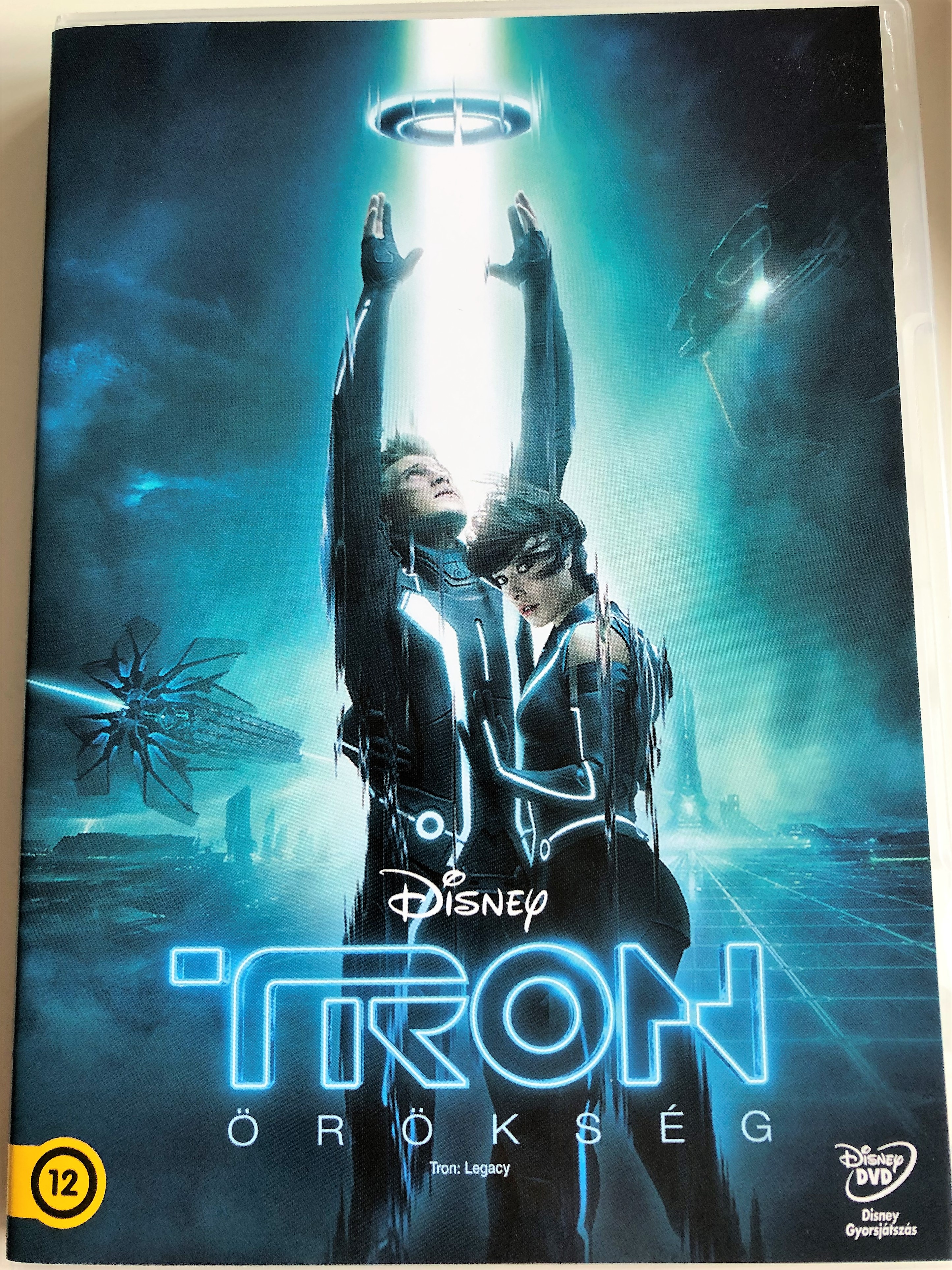 tron-legacy-dvd-2010-tron-r-ks-g-directed-by-joseph-kosinski-starring-jeff-bridges-garrett-hedlund-olivia-wilde-bruce-boxleitner-michael-sheen-james-frain-beau-garrett-disney-1-.jpg