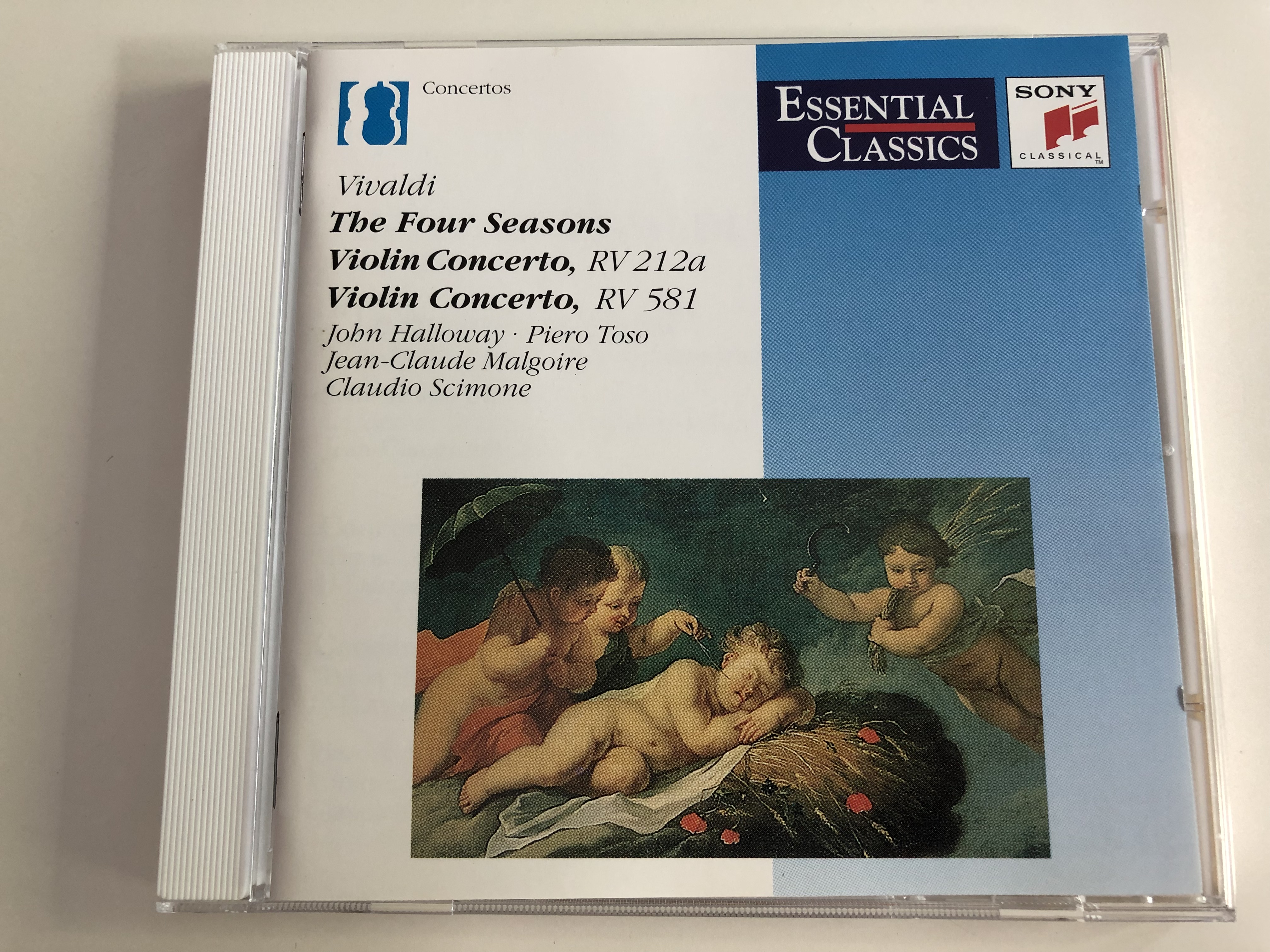 vivaldi-the-four-seasons-violin-concerto-rv212a-violin-concerto-rv-581-john-halloway-piero-toso-jean-claude-malgorie-claudio-scimone-essential-classics-audio-cd-1991-sbk-47-662-1-.jpg
