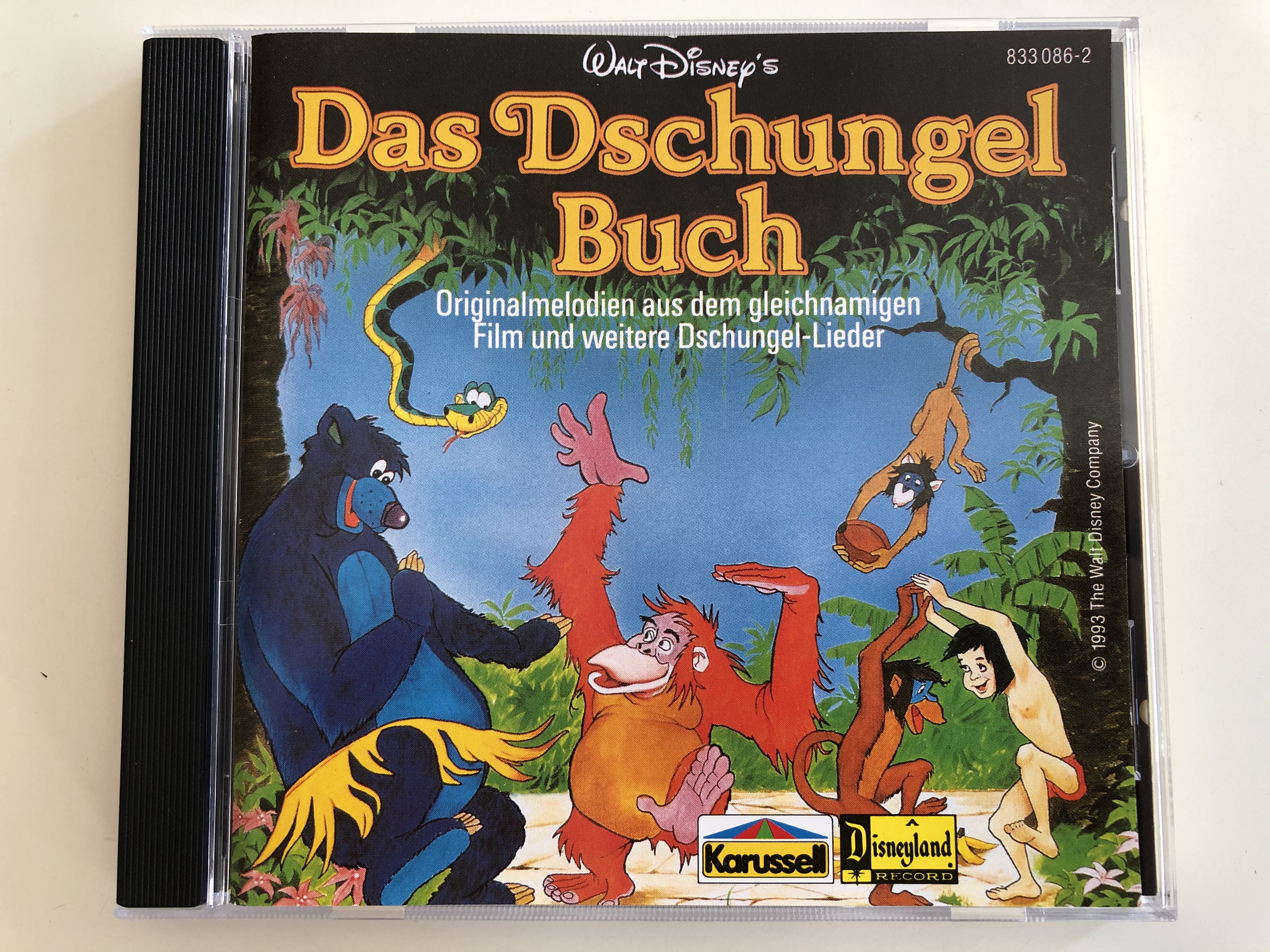 walt-disney-s-das-dschungel-buch-originalmelodien-aus-dem-gleichnamigen-film-und-weiter-dschungel-lieder-karussell-audio-cd-stereo-833-086-2-1-.jpg