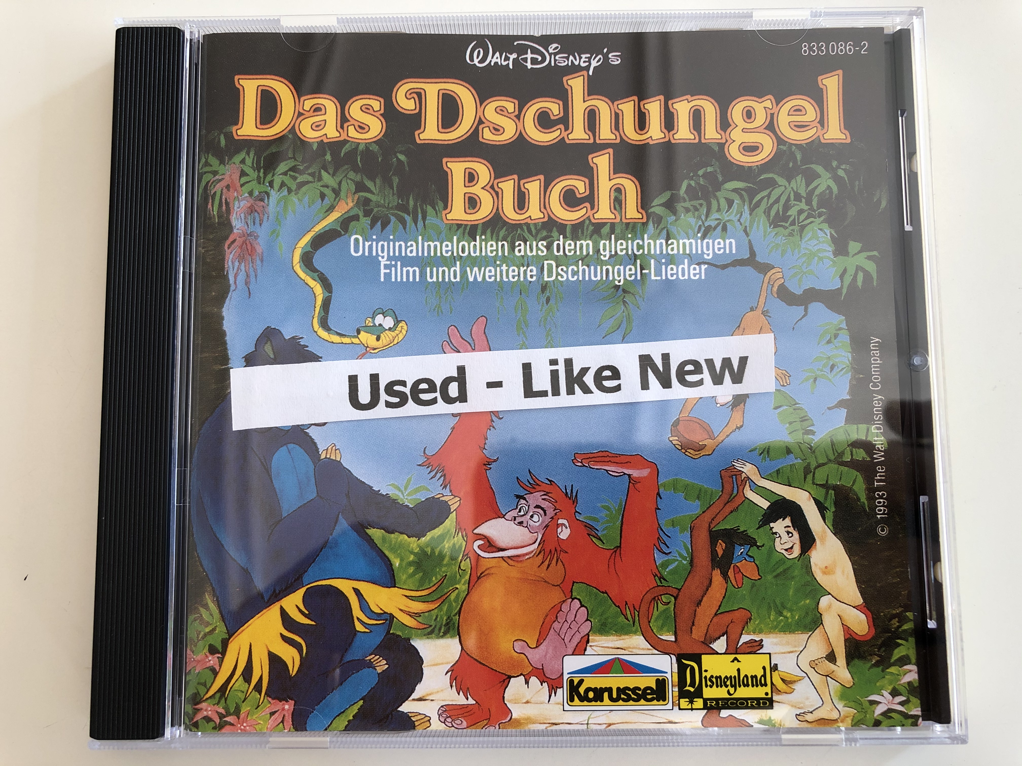 walt-disney-s-das-dschungel-buch-originalmelodien-aus-dem-gleichnamigen-film-und-weiter-dschungel-lieder-karussell-audio-cd-stereo-833-086-2-6-.jpg