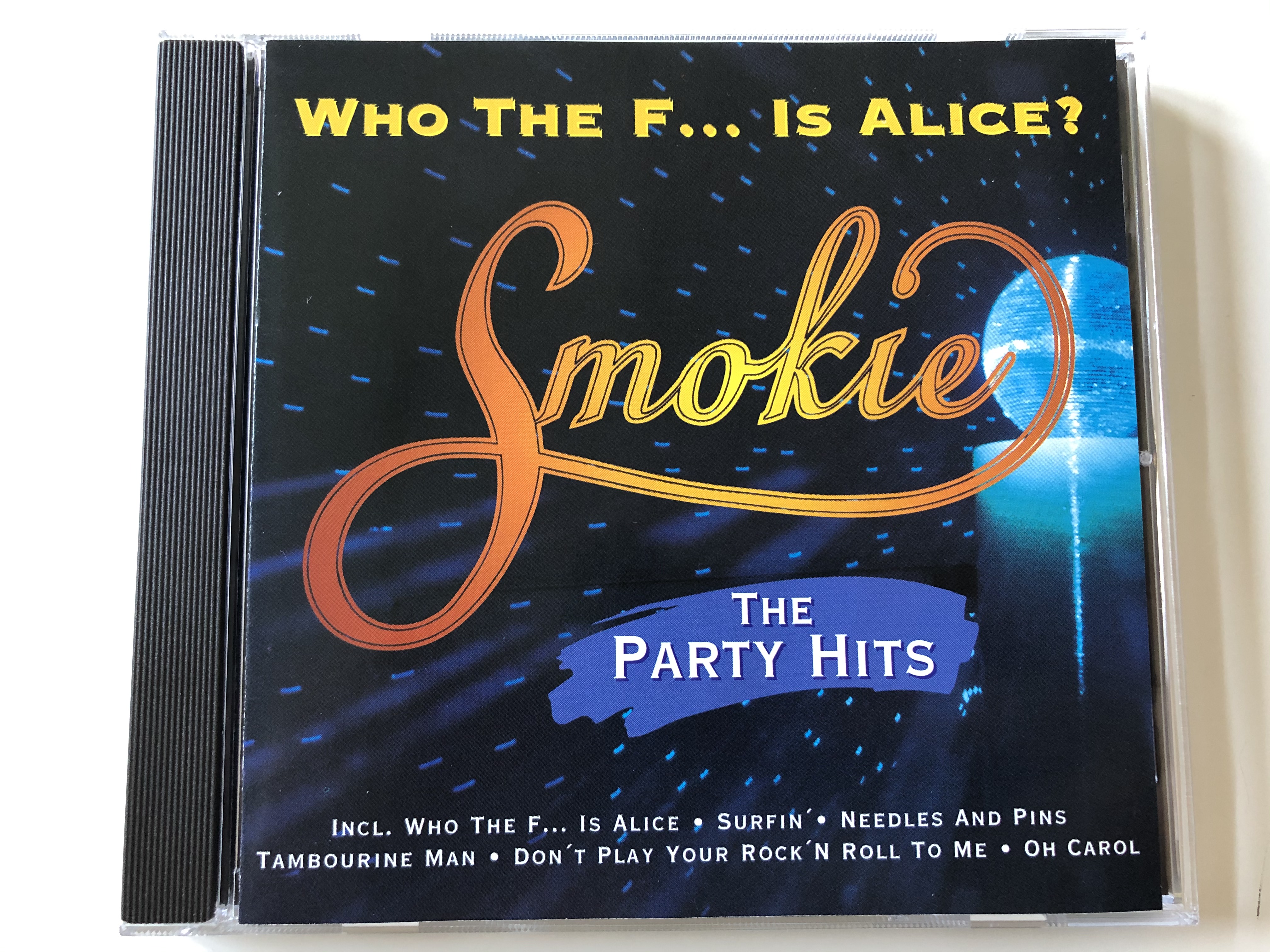 who-the-f...-is-alice-smokie-the-party-hits-incl.-who-the-f...-is-alice-surfin-needles-and-pins-tambourine-man-don-t-play-your-rock-n-roll-to-me-oh-carol-emi-electrola-audio-cd-7243-1-.jpg