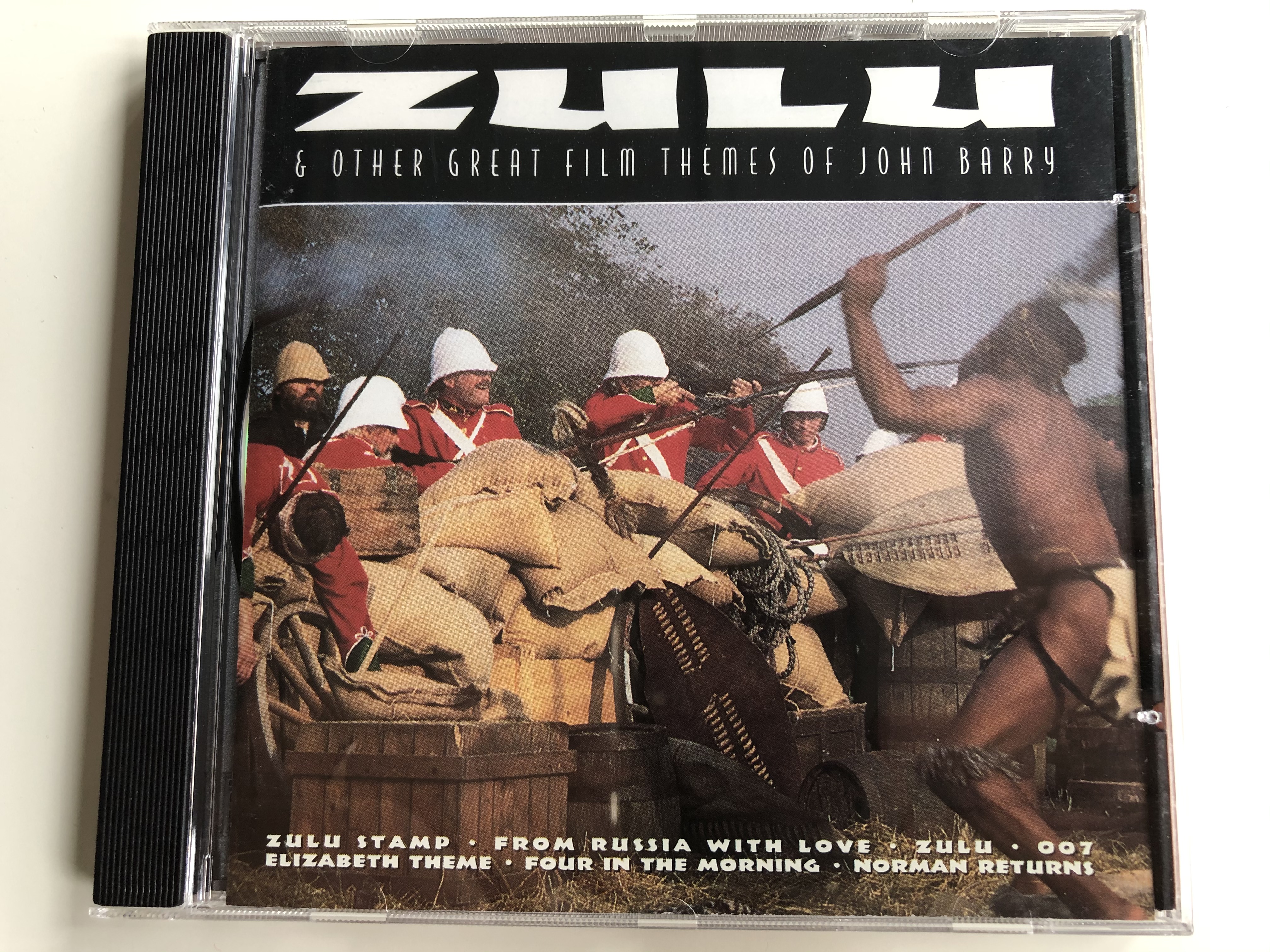zulu-other-great-film-themes-of-john-barry-zulu-stamp-from-russia-with-love-zulu-007-elizabeth-theme-four-in-the-morning-norman-returns-castle-communications-audio-cd-1995-mac-cd-2-1-.jpg