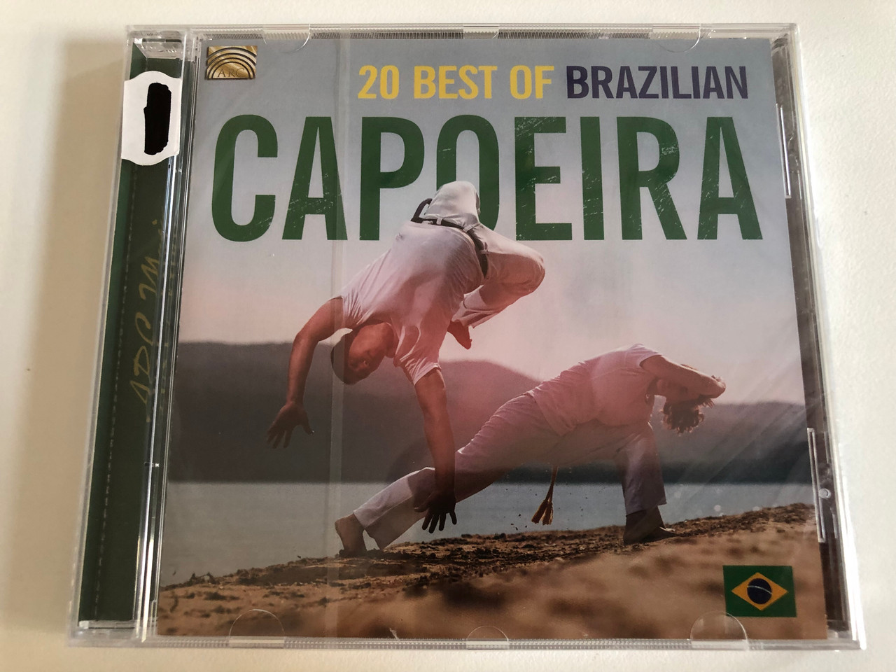 https://cdn10.bigcommerce.com/s-62bdpkt7pb/products/0/images/186122/20_Best_of_Brazilian_Capoeira_ARC_Music_Audio_CD_2019_EUCD2828_1__97882.1628086296.1280.1280.JPG?c=2&_gl=1*11e2it9*_ga*MjA2NTIxMjE2MC4xNTkwNTEyNTMy*_ga_WS2VZYPC6G*MTYyODA3NDQ2NC4xOS4xLjE2MjgwODYxOTUuMTQ.
