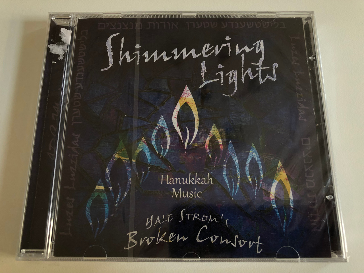https://cdn10.bigcommerce.com/s-62bdpkt7pb/products/0/images/186128/Shimmering_Lights_Hanukkah_Music_Yale_Stroms_Broken_Consort_ARC_Music_Audio_CD_2018_EUCD2809_1__23908.1628088317.1280.1280.JPG?c=2&_gl=1*1uebvpe*_ga*MjA2NTIxMjE2MC4xNTkwNTEyNTMy*_ga_WS2VZYPC6G*MTYyODA3NDQ2NC4xOS4xLjE2MjgwODg2NDEuNjA.