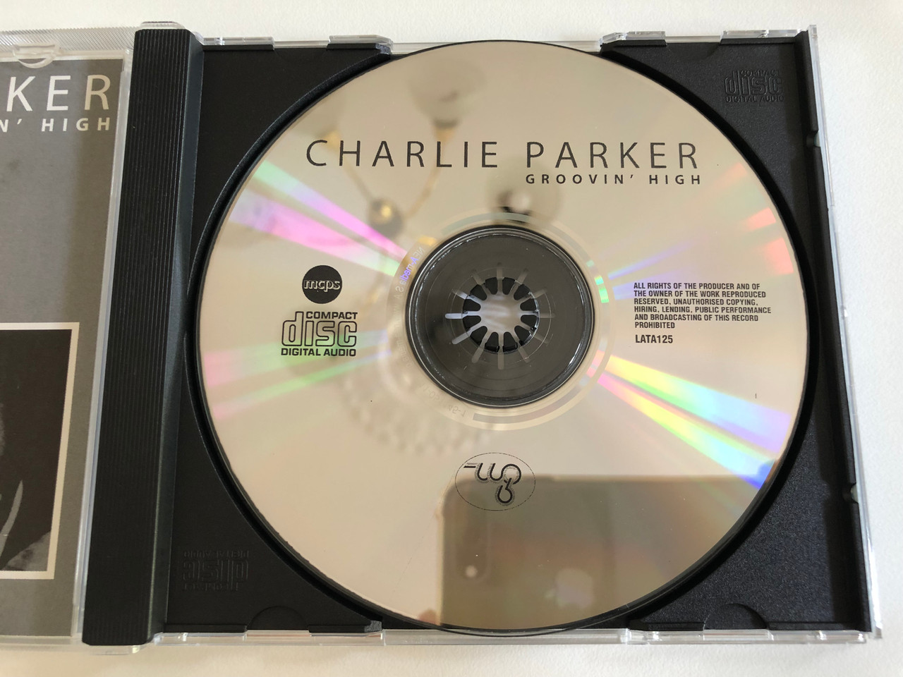 https://cdn10.bigcommerce.com/s-62bdpkt7pb/products/0/images/186266/Charlie_Parker_Groovin_High_Weton-Wesgram_Audio_CD_2005_LATA125_3__63255.1628181546.1280.1280.JPG?c=2&_gl=1*1ay35k5*_ga*MjA2NTIxMjE2MC4xNTkwNTEyNTMy*_ga_WS2VZYPC6G*MTYyODE3ODc5Ni4yMC4xLjE2MjgxODE2MDkuNjA.