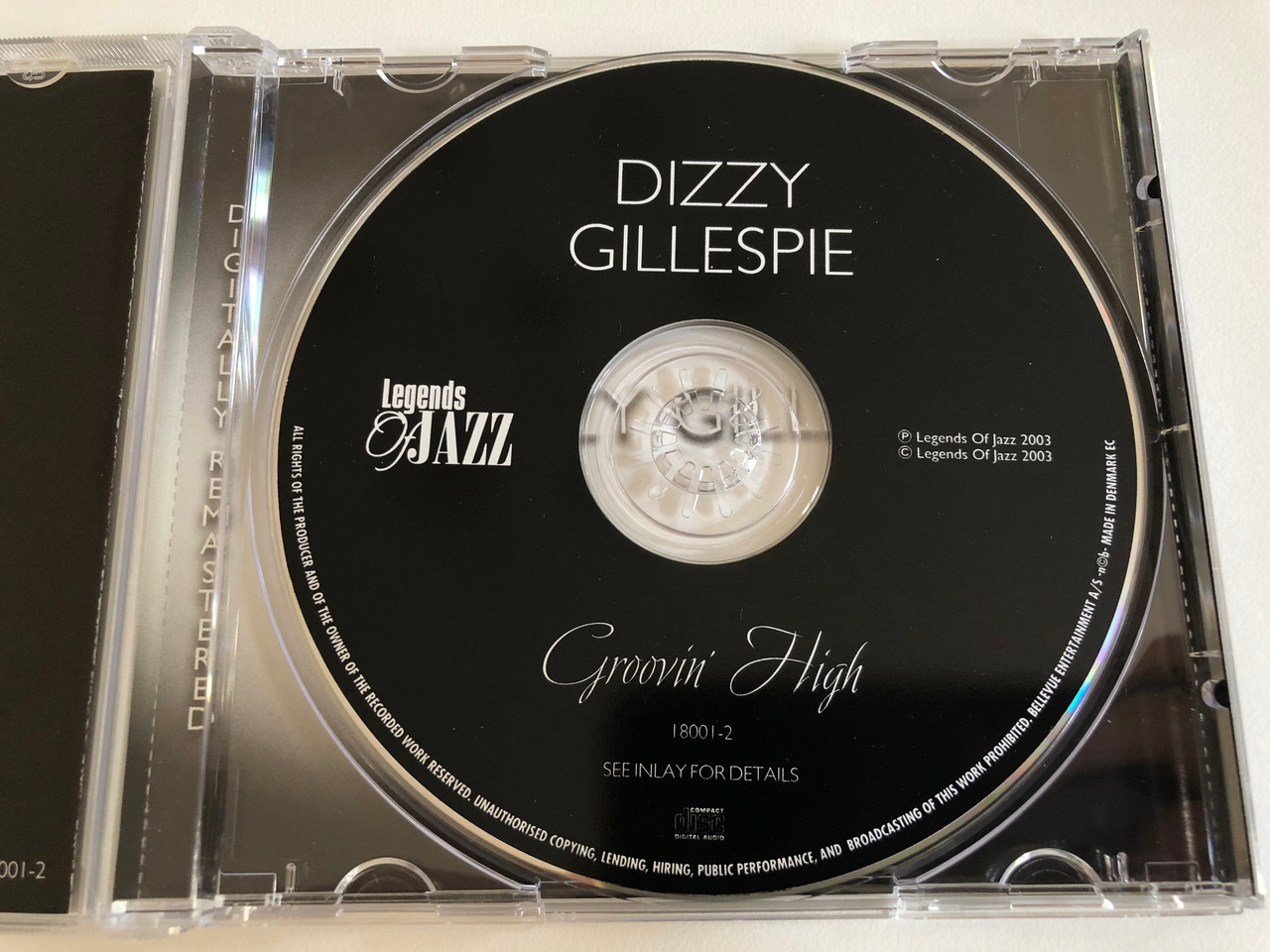 https://cdn10.bigcommerce.com/s-62bdpkt7pb/products/0/images/186307/Dizzy_Gillespie_Groovin_High_Legends_Of_Jazz_Audio_CD_2003_18001-2_3__73595.1628185406.1280.1280.JPG?c=2&_gl=1*1a2jys5*_ga*MjA2NTIxMjE2MC4xNTkwNTEyNTMy*_ga_WS2VZYPC6G*MTYyODE3ODc5Ni4yMC4xLjE2MjgxODUyOTMuNDM.