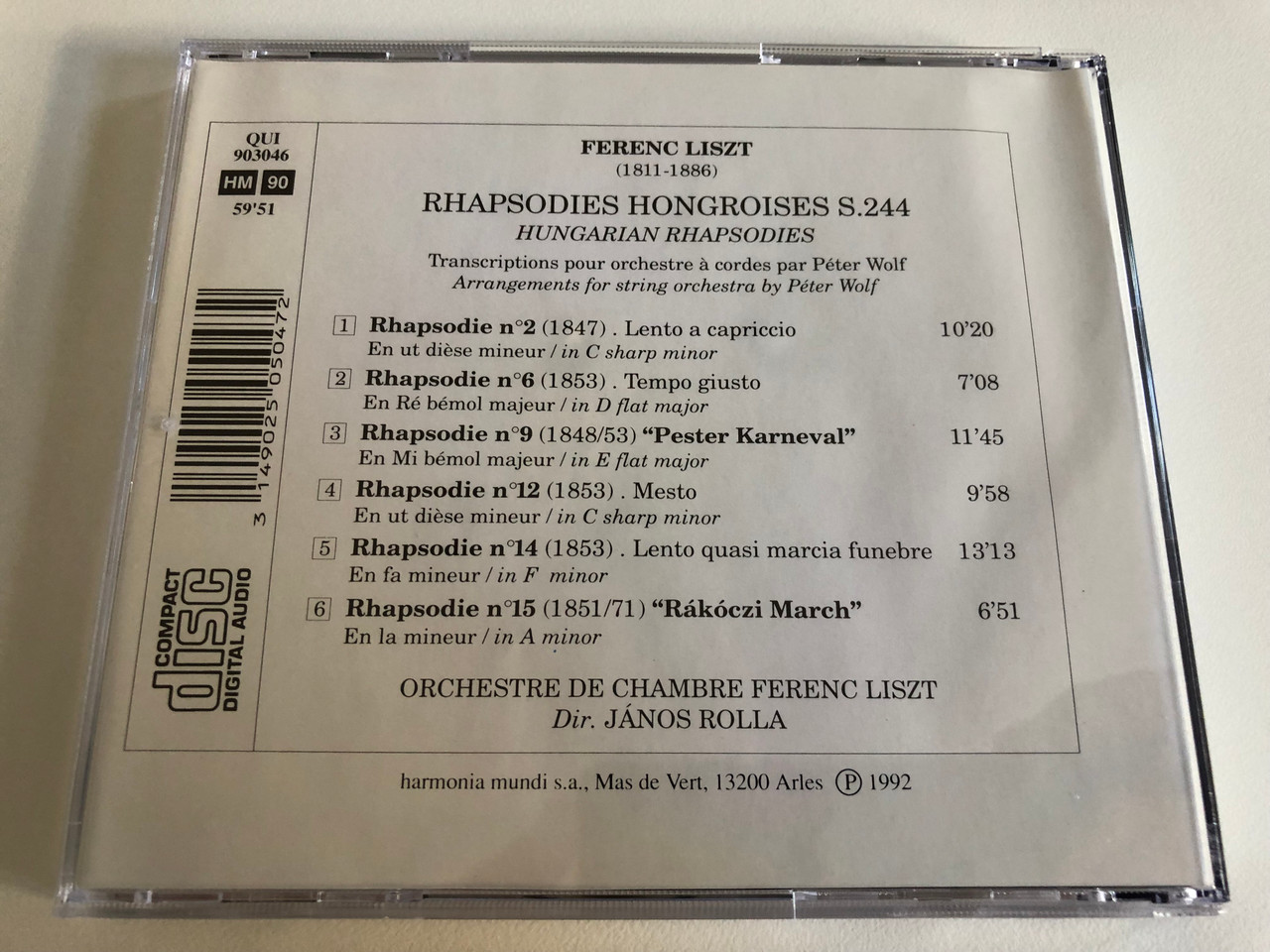 https://cdn10.bigcommerce.com/s-62bdpkt7pb/products/0/images/186494/Liszt_-_Rhapsodies_Hongroises_Orchestre_De_Chambre_Ferenc_Liszt_Jnos_Rolla_Quintana_Audio_CD_1992_QUI_903046_4__06668.1628272566.1280.1280.JPG?c=2&_gl=1*1yuzh4p*_ga*MjA2NTIxMjE2MC4xNTkwNTEyNTMy*_ga_WS2VZYPC6G*MTYyODI2Mjk5MS4yMS4xLjE2MjgyNzI2NjguNjA.