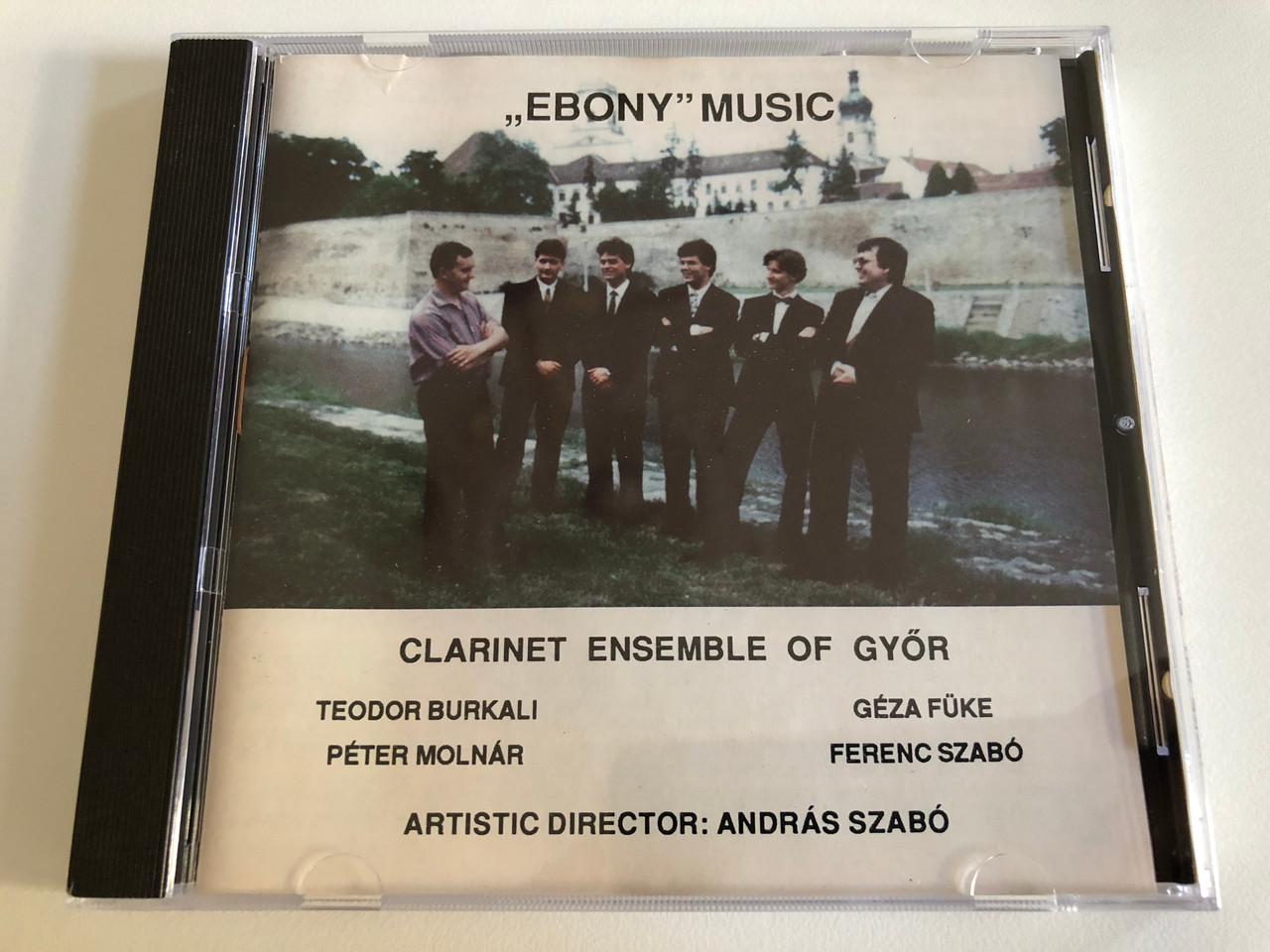 https://cdn10.bigcommerce.com/s-62bdpkt7pb/products/0/images/186589/Ebony_Music_-_Clarinet_Ensemble_Of_Gyor_Teodor_Burkali_Peter_Molnar_Geza_Fuke_Ferenc_Szabo_Artistic_Director_Andras_Szabo_Audio_CD_1993_VGKE_001_1__48084.1628483657.1280.1280.JPG?c=2&_gl=1*19rvn65*_ga*MjA2NTIxMjE2MC4xNTkwNTEyNTMy*_ga_WS2VZYPC6G*MTYyODQ4MTkyOC4yMi4xLjE2Mjg0ODQwMzAuNjA.
