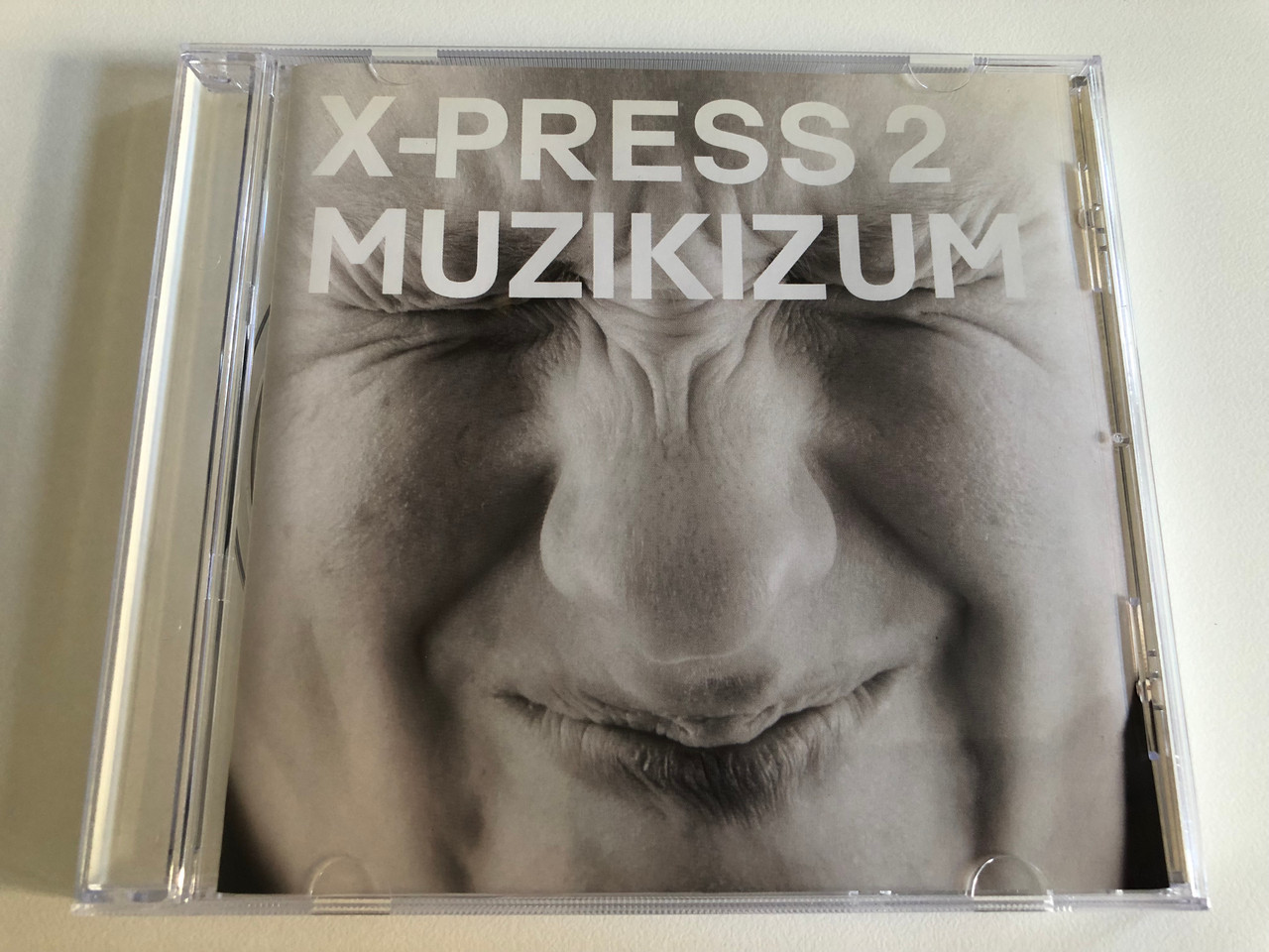 https://cdn10.bigcommerce.com/s-62bdpkt7pb/products/0/images/186612/X-Press_2_Muzikizum_Skint_Audio_CD_2002_507666_2_1__21285.1628486588.1280.1280.JPG?c=2&_gl=1*mw6tdj*_ga*MjA2NTIxMjE2MC4xNTkwNTEyNTMy*_ga_WS2VZYPC6G*MTYyODQ4MTkyOC4yMi4xLjE2Mjg0ODY0MDQuNTg.