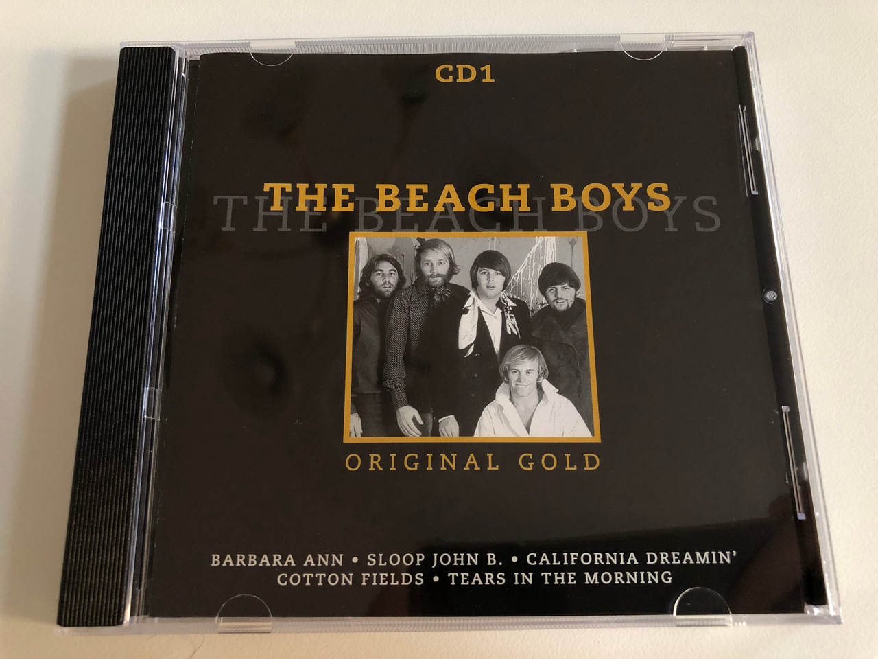 https://cdn10.bigcommerce.com/s-62bdpkt7pb/products/0/images/186712/The_Beach_Boys_Original_Gold_-_CD_1_Barbara_Ann_Sloop_John_B._California_Dreamin_Cotton_Fields_Tears_In_The_Morning_Disky_Audio_CD_1999_BX_857892_1__16176.1628509790.1280.1280.JPG?c=2&_gl=1*1r1pnmu*_ga*MjA2NTIxMjE2MC4xNTkwNTEyNTMy*_ga_WS2VZYPC6G*MTYyODUwODI4My4yMy4xLjE2Mjg1MDkzODIuNTY.