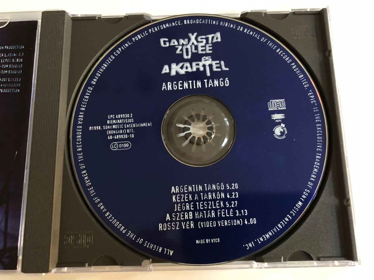 https://cdn10.bigcommerce.com/s-62bdpkt7pb/products/0/images/186751/Ganxsta_Zolee_s_A_Kartel_Argentin_Tang_Epic_Audio_CD_1998_EPC_489930_2_3__40253.1628566943.1280.1280.JPG?c=2&_gl=1*1iedef3*_ga*MjA2NTIxMjE2MC4xNTkwNTEyNTMy*_ga_WS2VZYPC6G*MTYyODU2NTI4Ny4yNC4xLjE2Mjg1NjY3NjkuMjE.
