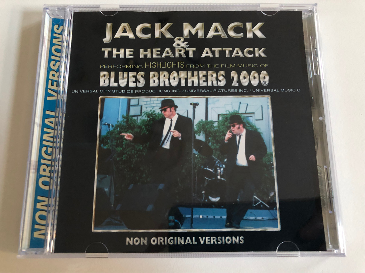https://cdn10.bigcommerce.com/s-62bdpkt7pb/products/0/images/186789/Jack_Mack_The_Heart_Attack_Performing_Highlights_From_The_Film_Music_Of_Blues_Brothers_2000_Eurotrend_Audio_CD_CD_157_1__92772.1628569550.1280.1280.JPG?c=2&_gl=1*69pk1c*_ga*MjA2NTIxMjE2MC4xNTkwNTEyNTMy*_ga_WS2VZYPC6G*MTYyODU2NTI4Ny4yNC4xLjE2Mjg1Njk1OTQuNjA.