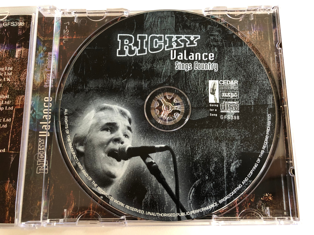 https://cdn10.bigcommerce.com/s-62bdpkt7pb/products/0/images/187000/Ricky_Valance_Sings_Country_Going_for_a_Song_Audio_CD_GFS398_3__11228.1628663871.1280.1280.JPG?c=2&_gl=1*1t0xkha*_ga*MjA2NTIxMjE2MC4xNTkwNTEyNTMy*_ga_WS2VZYPC6G*MTYyODY1NzM5OS4yNy4xLjE2Mjg2NjQxMzQuNjA.
