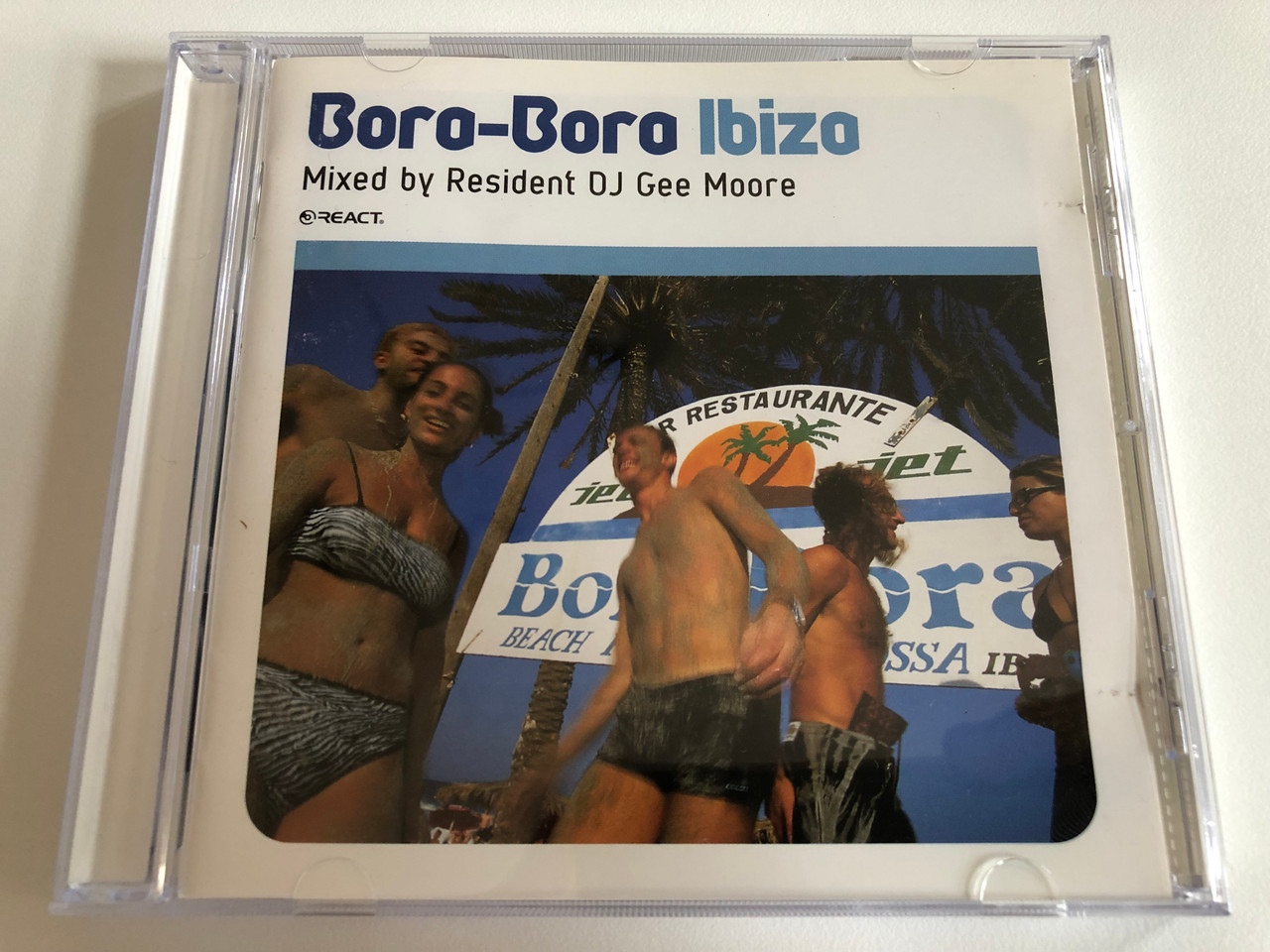 https://cdn10.bigcommerce.com/s-62bdpkt7pb/products/0/images/187019/Bora-Bora_Ibiza_-_Mixed_by_Resident_DJ_Gee_Moore_React_Audio_CD_1999_REACT_CD_163_1__43288.1628666222.1280.1280.JPG?c=2&_gl=1*o48mox*_ga*MjA2NTIxMjE2MC4xNTkwNTEyNTMy*_ga_WS2VZYPC6G*MTYyODY1NzM5OS4yNy4xLjE2Mjg2NjYzNzkuNjA.