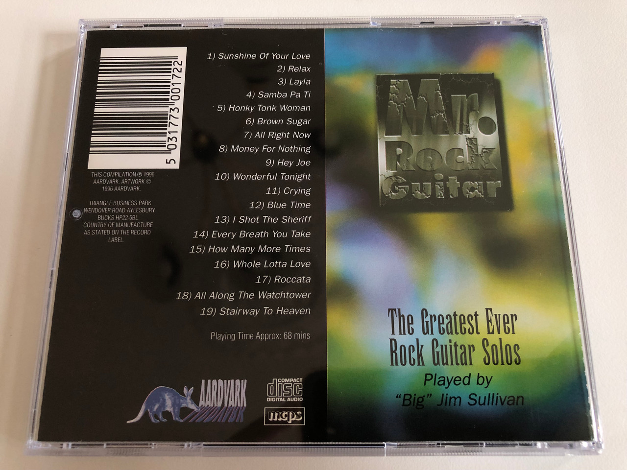 https://cdn10.bigcommerce.com/s-62bdpkt7pb/products/0/images/187032/Mr._Rock_Guitar_-_The_Greatest_Ever_Rock_Guitar_Solos_Aardvark_Audio_CD_1996_ANT017_5__22338.1628668813.1280.1280.JPG?c=2&_gl=1*sfhy7b*_ga*MjA2NTIxMjE2MC4xNTkwNTEyNTMy*_ga_WS2VZYPC6G*MTYyODY2ODg2Ni4yOC4wLjE2Mjg2Njg4NjYuNjA.