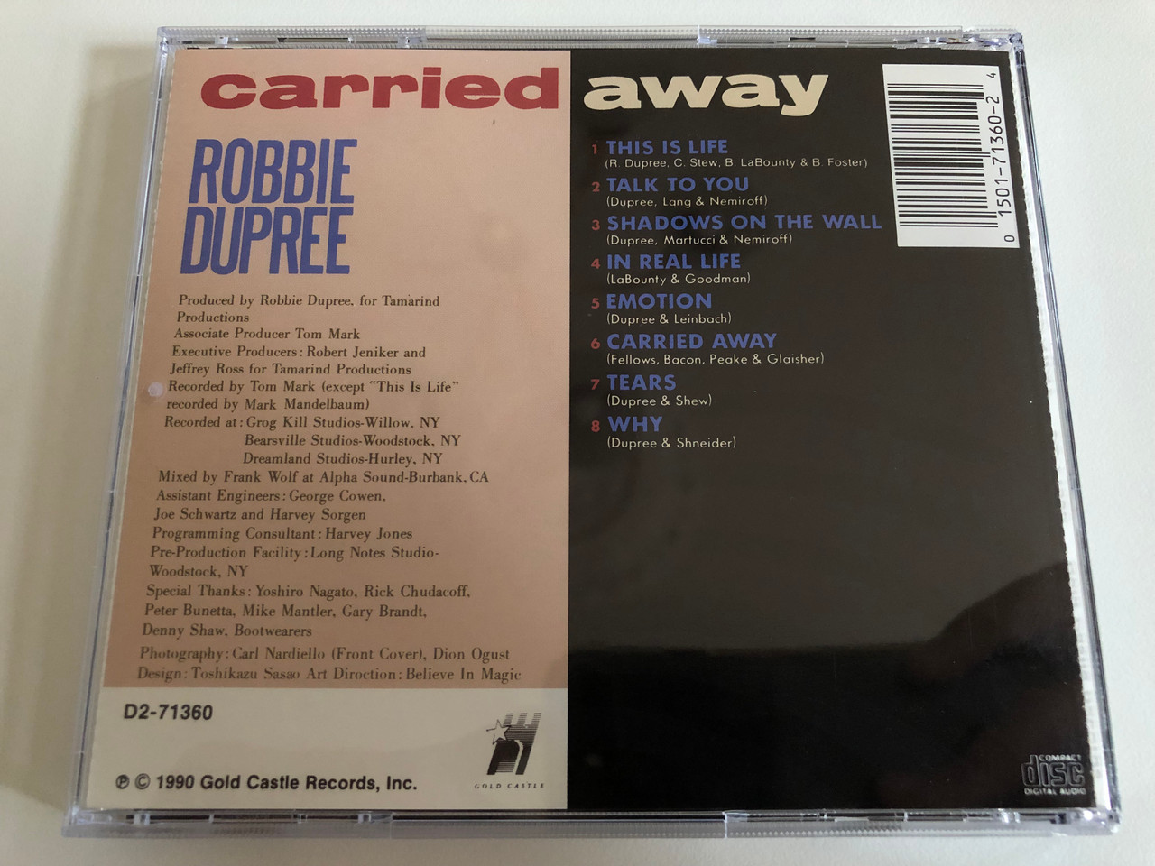 https://cdn10.bigcommerce.com/s-62bdpkt7pb/products/0/images/187198/Robbie_Dupree_Carried_Away_Gold_Castle_Audio_CD_1990_D2-71360_7__12655.1628745321.1280.1280.JPG?c=2&_gl=1*12e0nd4*_ga*MjA2NTIxMjE2MC4xNTkwNTEyNTMy*_ga_WS2VZYPC6G*MTYyODc0Mzc3MS4yOS4xLjE2Mjg3NDUyMDguNDI.