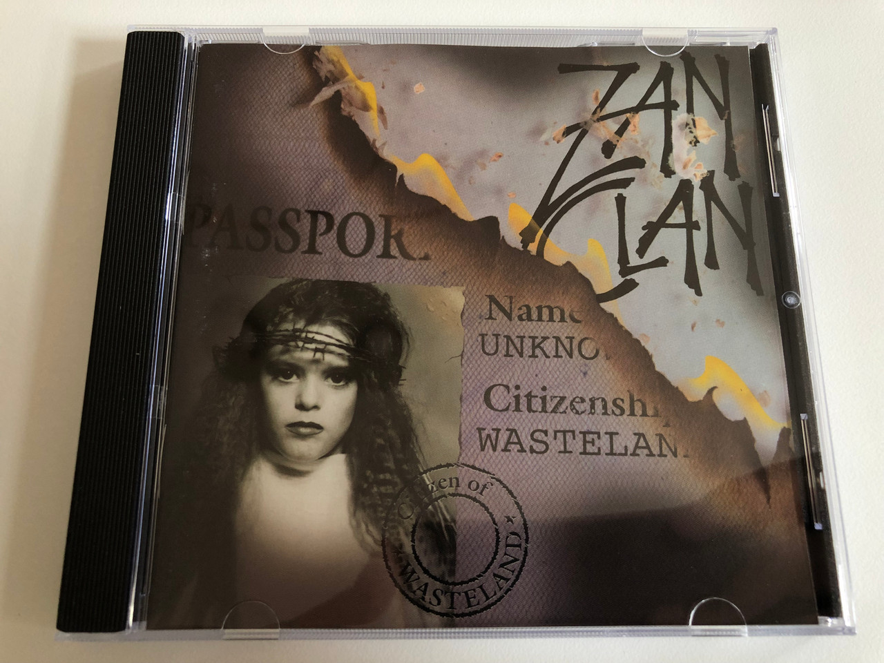 https://cdn10.bigcommerce.com/s-62bdpkt7pb/products/0/images/187244/Zan_Clan_Citizen_Of_Wasteland_SMC_Records_Audio_CD_1994_SMC_10131_1__81755.1628756769.1280.1280.JPG?c=2&_gl=1*1pb3034*_ga*MjA2NTIxMjE2MC4xNTkwNTEyNTMy*_ga_WS2VZYPC6G*MTYyODc1NDIxMC4zMC4xLjE2Mjg3NTY0NDMuNTE.