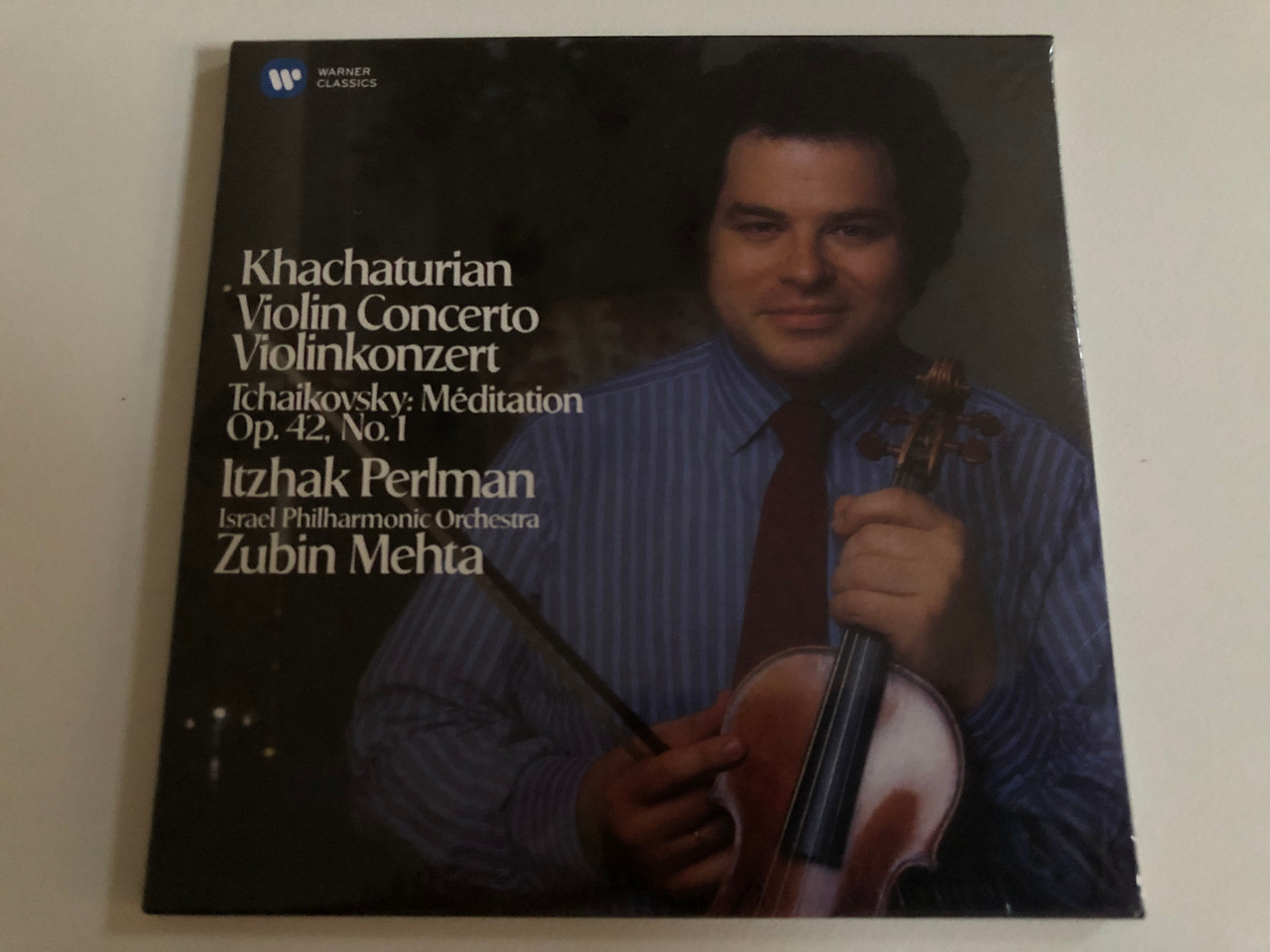 https://cdn10.bigcommerce.com/s-62bdpkt7pb/products/0/images/187295/Kachaturian_Violin_Concerto_Violinkonzert_-_Tchaikovsky_Meditation_Op._42_No._1_Itzhak_Perlman_Israel_Philharmonic_Orchestra_Zubin_Mehta_Warner_Classics_Audio_CD_2015_Warner_Classics_1__63575.1628763568.1280.1280.JPG?c=2&_gl=1*rm7d93*_ga*MjA2NTIxMjE2MC4xNTkwNTEyNTMy*_ga_WS2VZYPC6G*MTYyODc1NDIxMC4zMC4xLjE2Mjg3NjMxOTcuNTk.