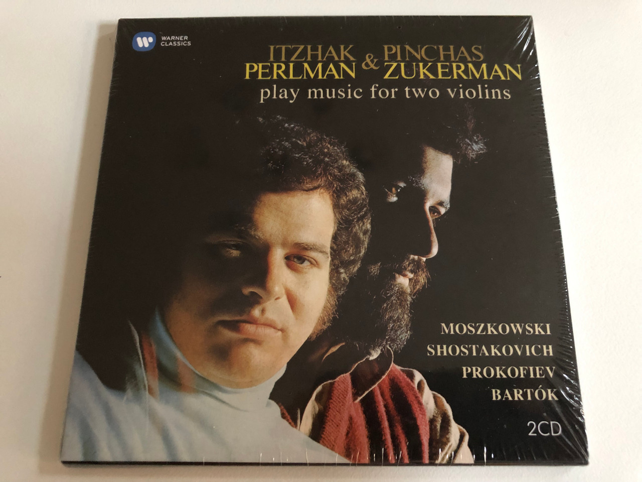 https://cdn10.bigcommerce.com/s-62bdpkt7pb/products/0/images/187297/Itzhak_Perlman_Pinchas_Zukerman_play_music_for_two_violins_Moszkowski_Shostakovich_Prokofiev_Bartok_Warner_Classics_2x_Audio_CD_2015_0825646130108_1__06106.1628763982.1280.1280.JPG?c=2&_gl=1*x0c9ql*_ga*MjA2NTIxMjE2MC4xNTkwNTEyNTMy*_ga_WS2VZYPC6G*MTYyODc1NDIxMC4zMC4xLjE2Mjg3NjQzMzAuNjA.