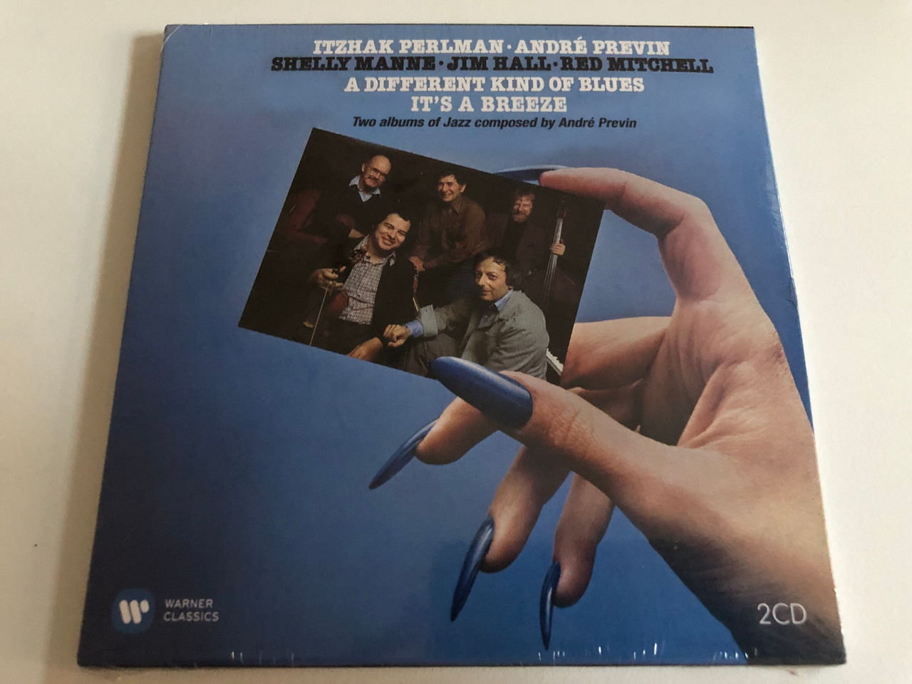 https://cdn10.bigcommerce.com/s-62bdpkt7pb/products/0/images/187300/Itzhak_Perlman_Andr_Previn_Shelly_Manne_Jim_Hall_Red_Mitchell_A_Different_Kind_Of_Blues_Its_A_Breeze_Two_albums_of_Jazz_composed_by_Andr_Previn_Warner_Classics_2x_Audio_CD_2015_0_1__89574.1628765286.1280.1280.JPG?c=2&_gl=1*nop6z5*_ga*MjA2NTIxMjE2MC4xNTkwNTEyNTMy*_ga_WS2VZYPC6G*MTYyODc1NDIxMC4zMC4xLjE2Mjg3NjU1ODMuNjA.