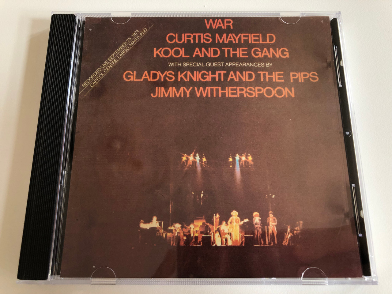 https://cdn10.bigcommerce.com/s-62bdpkt7pb/products/0/images/187507/War_Curtis_Mayfield_Kool_And_The_Gang_With_Special_Guest_Appearances_By_Gladys_Knight_And_The_Pips_Jimmy_Witherspoon_Recorded_Live_September_25_1974_Capitol_Centre_Largo_Maryland_Ch_1__82759.1628853394.1280.1280.JPG?c=2&_gl=1*1jvjn8*_ga*MjA2NTIxMjE2MC4xNTkwNTEyNTMy*_ga_WS2VZYPC6G*MTYyODg0NTUyMi4zMi4xLjE2Mjg4NTM1MDQuNjA.