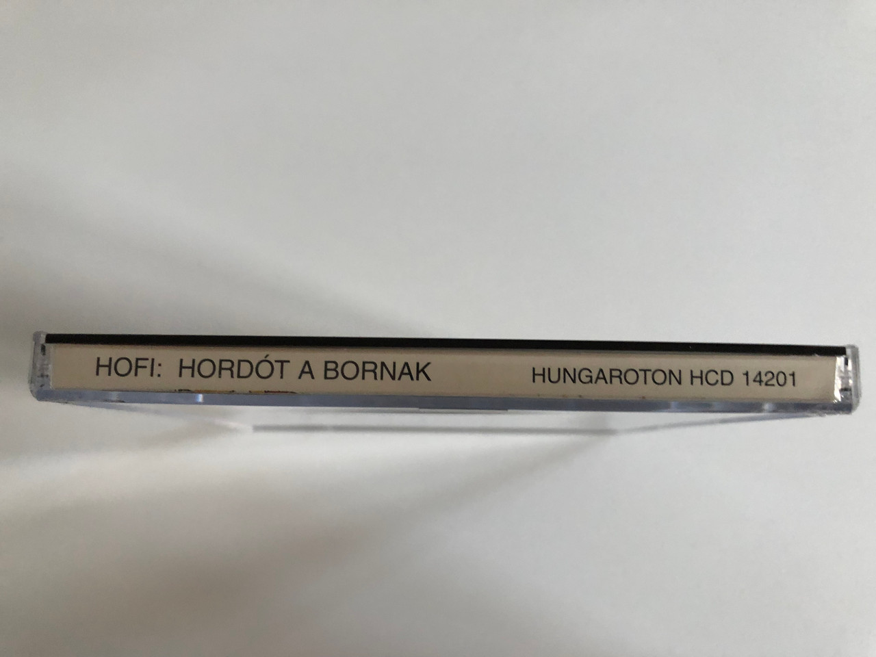 https://cdn10.bigcommerce.com/s-62bdpkt7pb/products/0/images/187931/Hofi_Hordt_A_Bornak_1989_Kisstadion_Hungaroton_Audio_CD_2001_HCD_14201_5__12437.1629210457.1280.1280.JPG?c=2&_gl=1*vtty7f*_ga*MjA2NTIxMjE2MC4xNTkwNTEyNTMy*_ga_WS2VZYPC6G*MTYyOTIwODAwMC4zNS4xLjE2MjkyMTA1ODIuNjA.