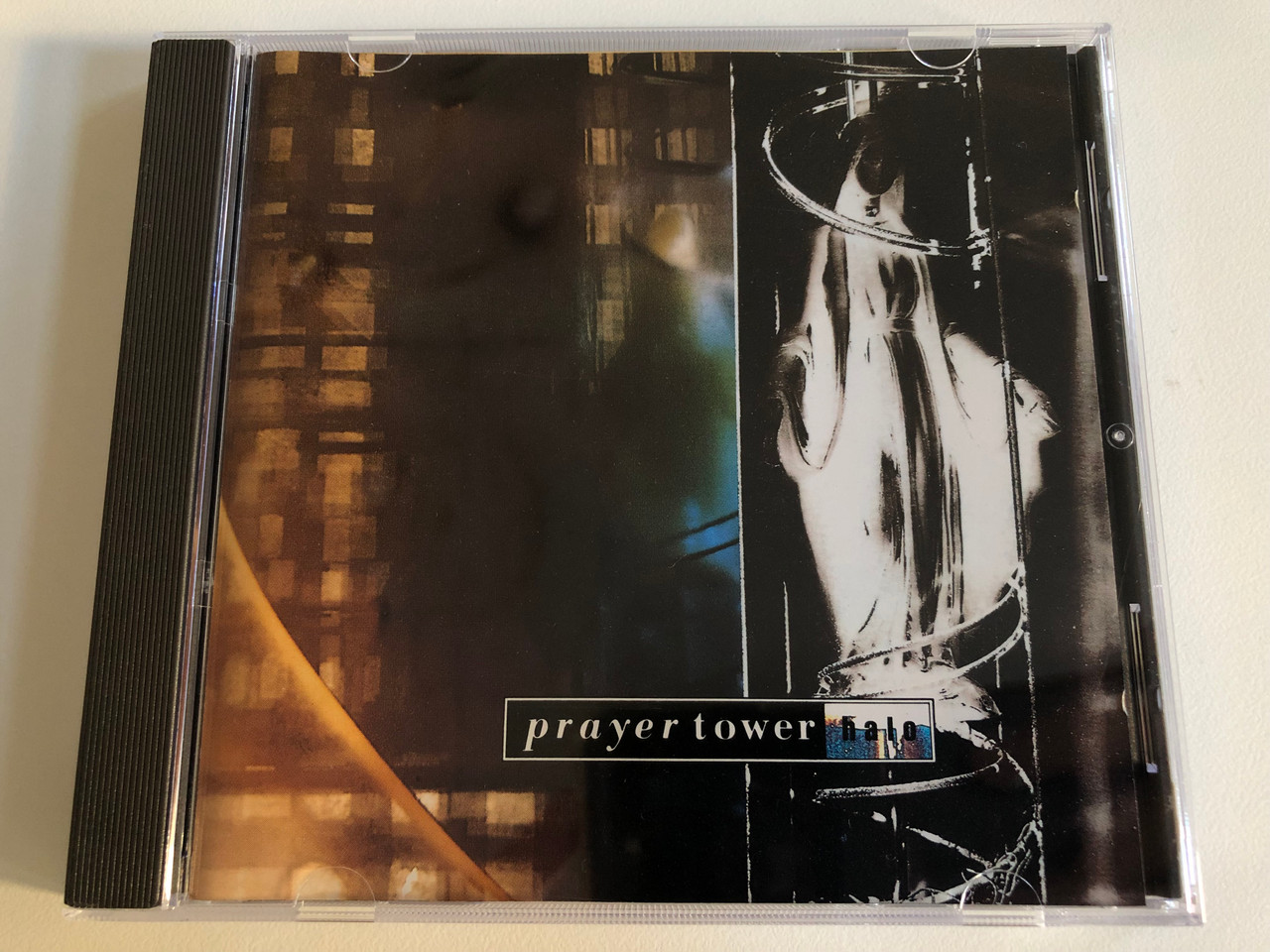 https://cdn10.bigcommerce.com/s-62bdpkt7pb/products/0/images/188044/Prayer_Tower_Halo_Third_Mind_Records_Audio_CD_1993_TM_9107_2_1__51542.1629218112.1280.1280.JPG?c=2&_gl=1*1rt2d2l*_ga*MjA2NTIxMjE2MC4xNTkwNTEyNTMy*_ga_WS2VZYPC6G*MTYyOTIwODAwMC4zNS4xLjE2MjkyMTc5ODMuNTU.