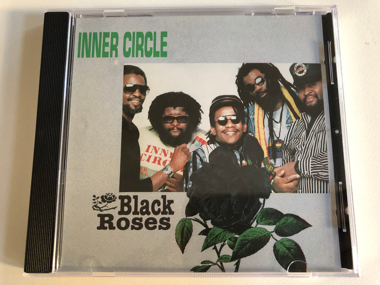 https://cdn10.bigcommerce.com/s-62bdpkt7pb/products/0/images/188061/Inner_Circle_Black_Roses_Real_Authentic_Sound_Audio_CD_1990_9031-73425-2_1__61857.1629219605.1280.1280.JPG?c=2&_gl=1*1fc4j6k*_ga*MjA2NTIxMjE2MC4xNTkwNTEyNTMy*_ga_WS2VZYPC6G*MTYyOTIwODAwMC4zNS4xLjE2MjkyMTk2ODYuNjA.