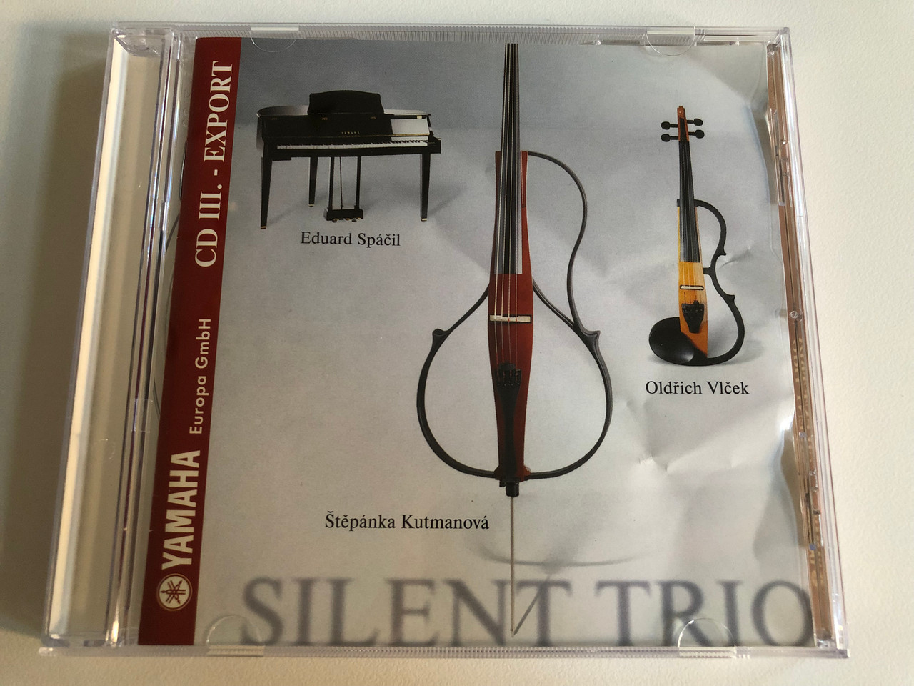 https://cdn10.bigcommerce.com/s-62bdpkt7pb/products/0/images/188292/Silent_Trio_-_Eduard_Spail_Oldrich_Viek_tepanka_Kutmanova_Midi_Music_Studio_Audio_CD_1999_MM_0007-2531_1__94888.1629390554.1280.1280.JPG?c=2&_gl=1*1tcimx6*_ga*MjA2NTIxMjE2MC4xNTkwNTEyNTMy*_ga_WS2VZYPC6G*MTYyOTM4MjA0Mi4zOS4xLjE2MjkzOTAzMTkuNDY.