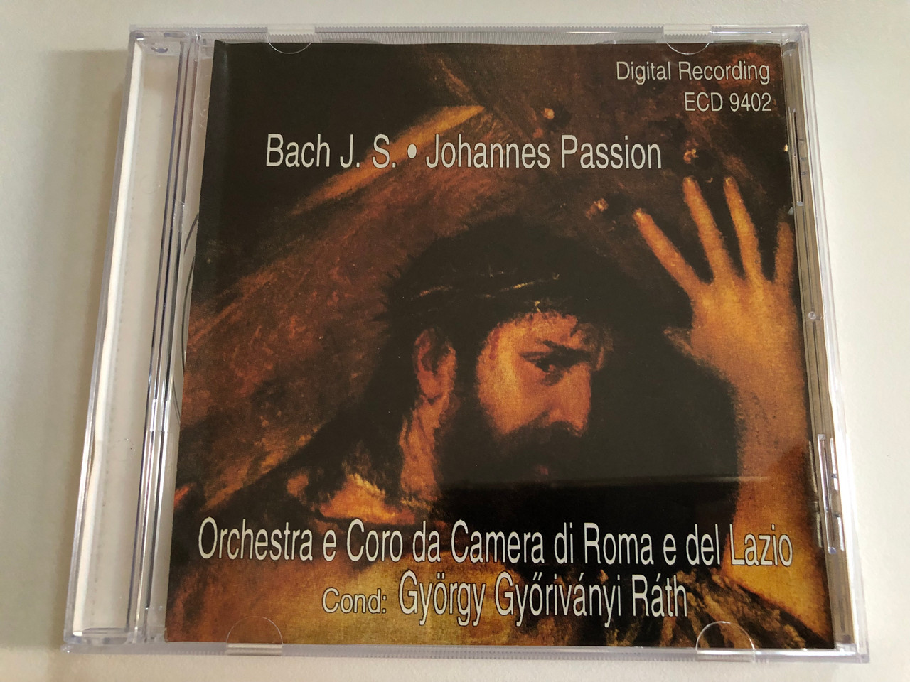 https://cdn10.bigcommerce.com/s-62bdpkt7pb/products/0/images/188391/Bach_J._S._-_Johannes_Passion_Orchestra_e_Coro_da_Camera_di_Roma_e_del_Lazio_Cond._Gyorgy_Gyorivanyi_Rath_Exorg_Audio_CD_1995_ECD_9402_1__73617.1629465090.1280.1280.JPG?c=2&_gl=1*bmrv4o*_ga*MjA2NTIxMjE2MC4xNTkwNTEyNTMy*_ga_WS2VZYPC6G*MTYyOTQ2MzgxOC40MC4xLjE2Mjk0NjQ3NzUuNTc.